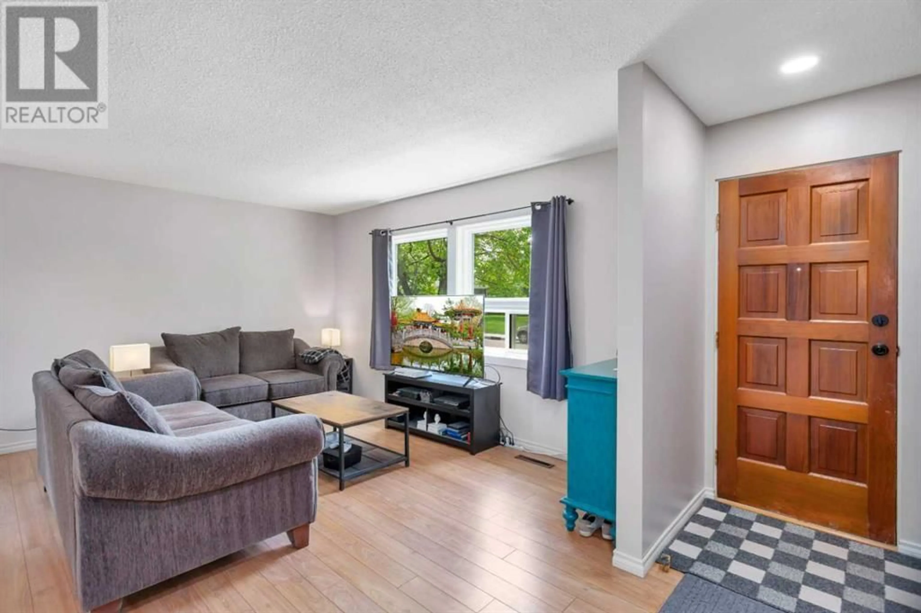 Living room with furniture, unknown for 14 OVINGTON CLOSE, Red Deer Alberta T4H5J3