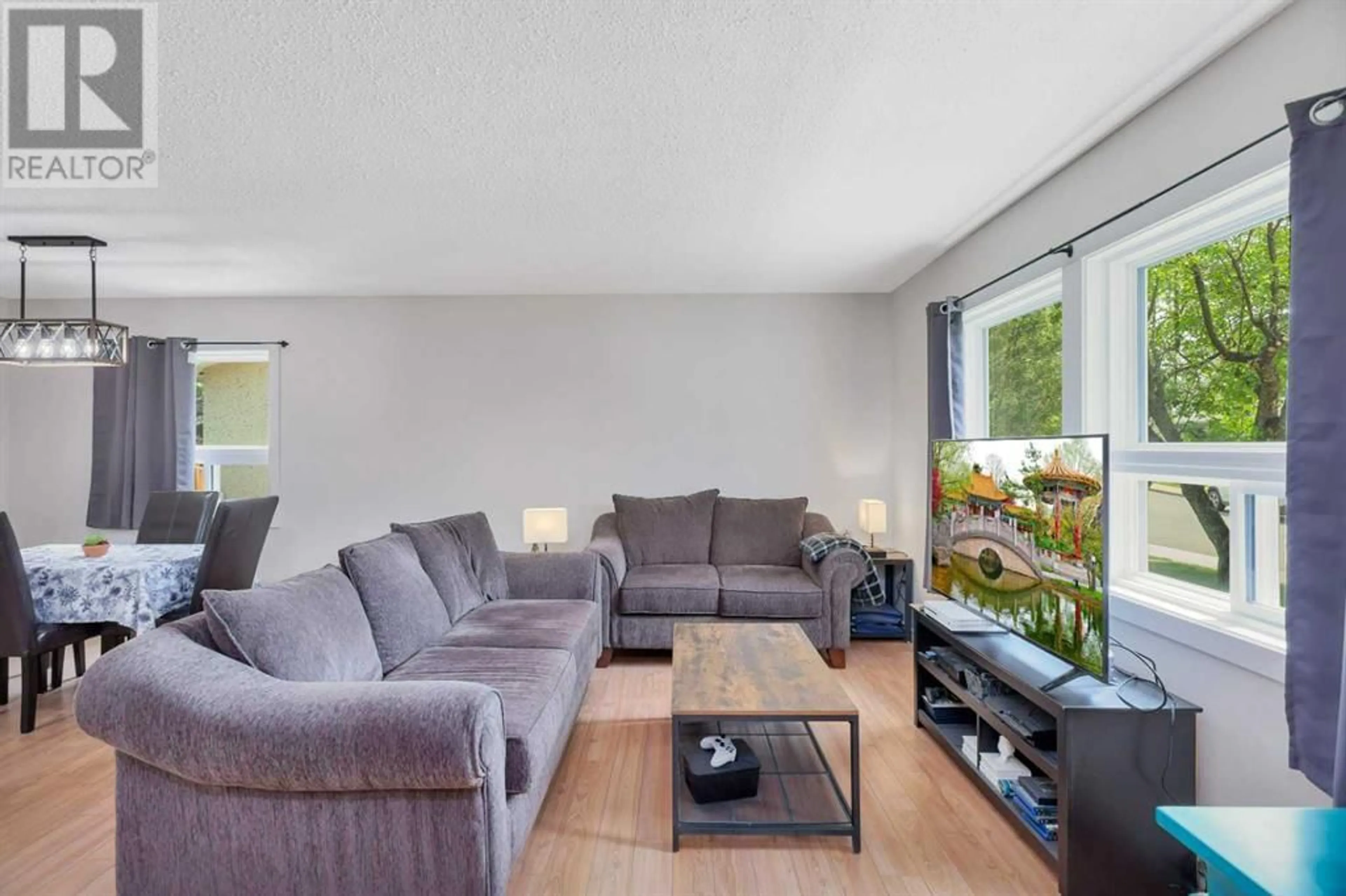 Living room with furniture, unknown for 14 OVINGTON CLOSE, Red Deer Alberta T4H5J3