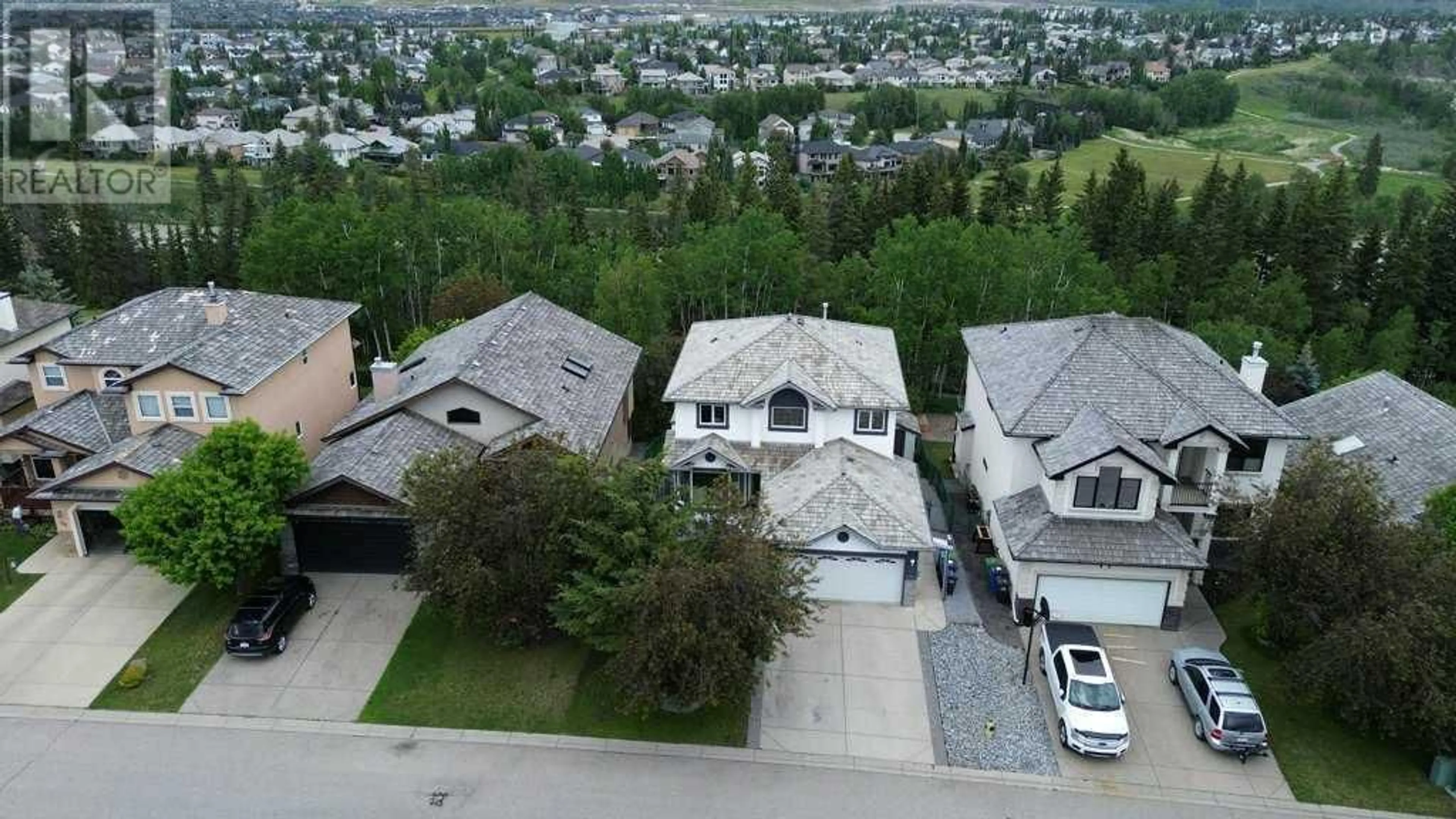 A pic from outside/outdoor area/front of a property/back of a property/a pic from drone, unknown for 52 BOW RIDGE CRESCENT, Cochrane Alberta T4C1T9