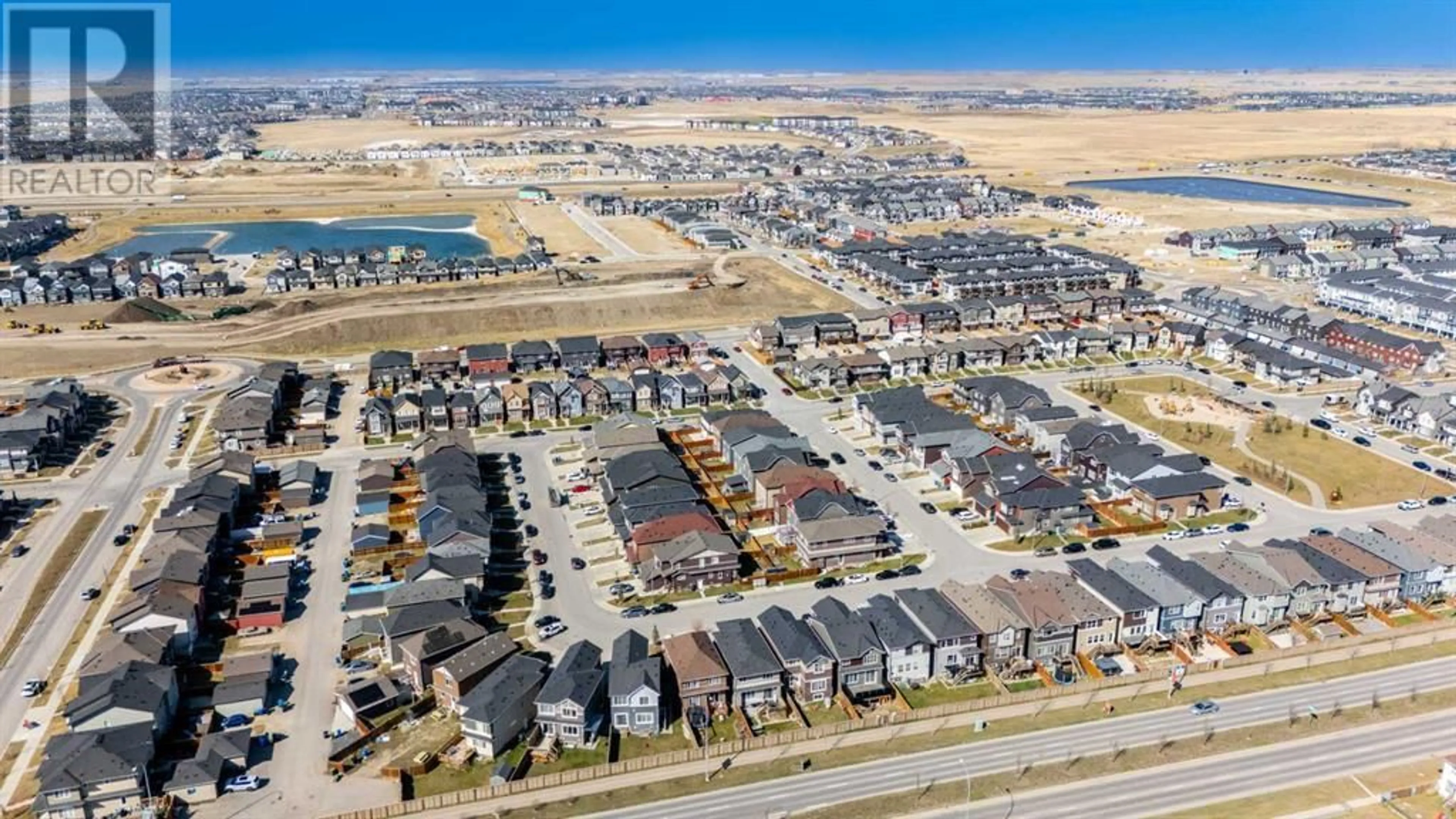 A pic from outside/outdoor area/front of a property/back of a property/a pic from drone, street for 71 SAVANNA PARADE NORTHEAST, Calgary Alberta T3J0V8