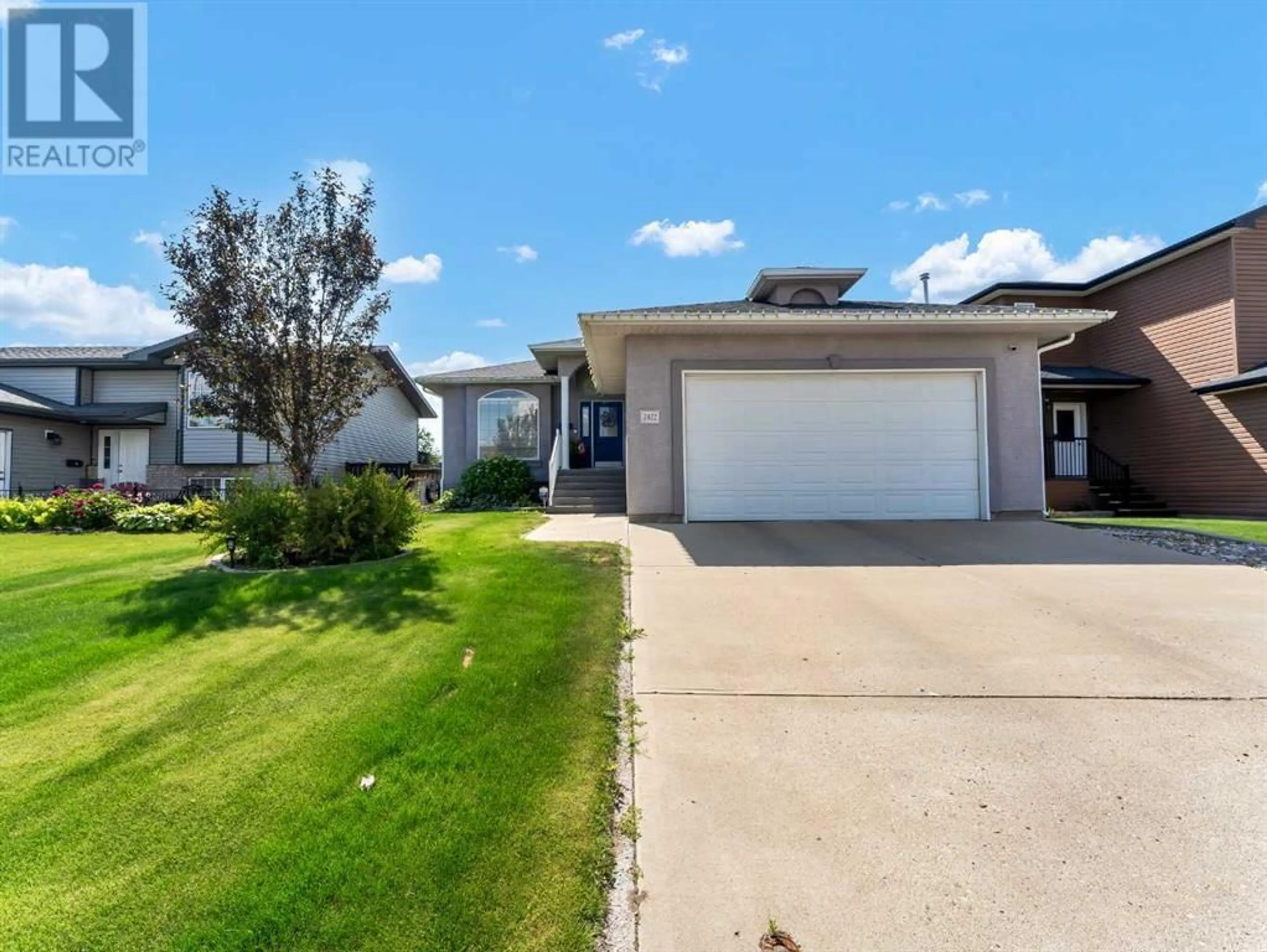 A pic from outside/outdoor area/front of a property/back of a property/a pic from drone, street for 2422 7 AVENUE NORTHEAST, Medicine Hat Alberta T1C1Y7