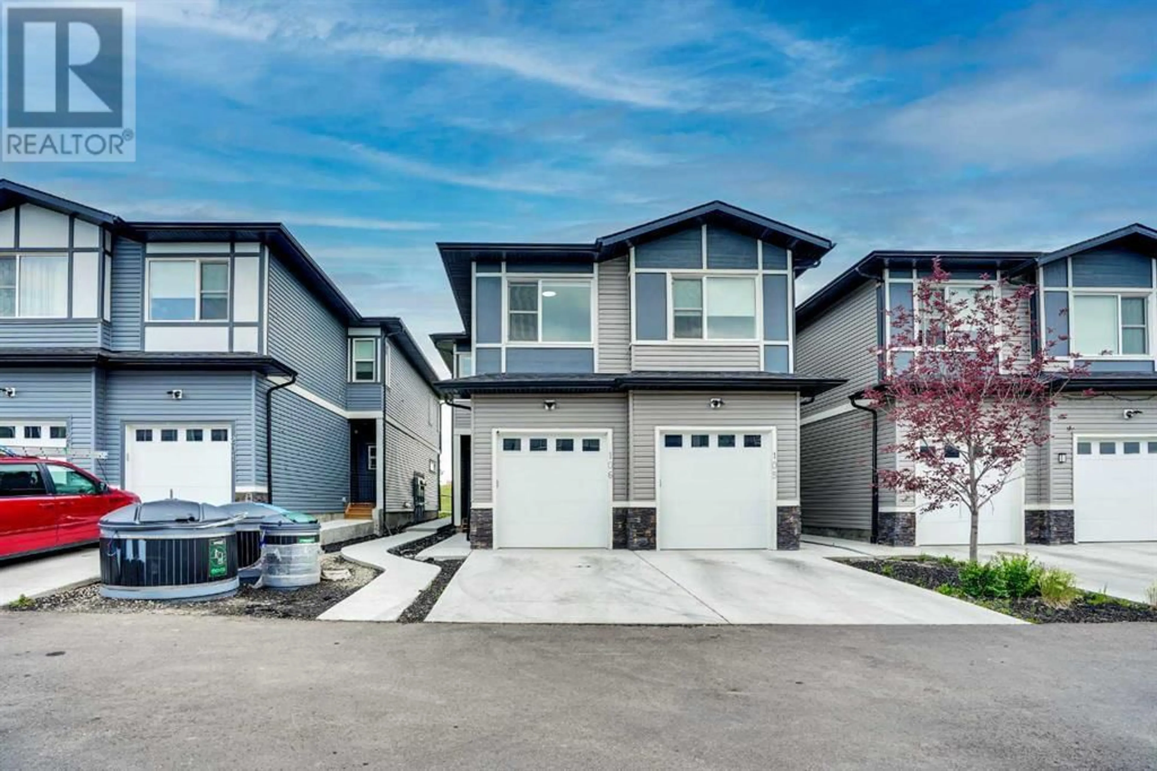 Home with vinyl exterior material, street for 116 SADDLESTONE HEATH NORTHEAST, Calgary Alberta T3J5K8