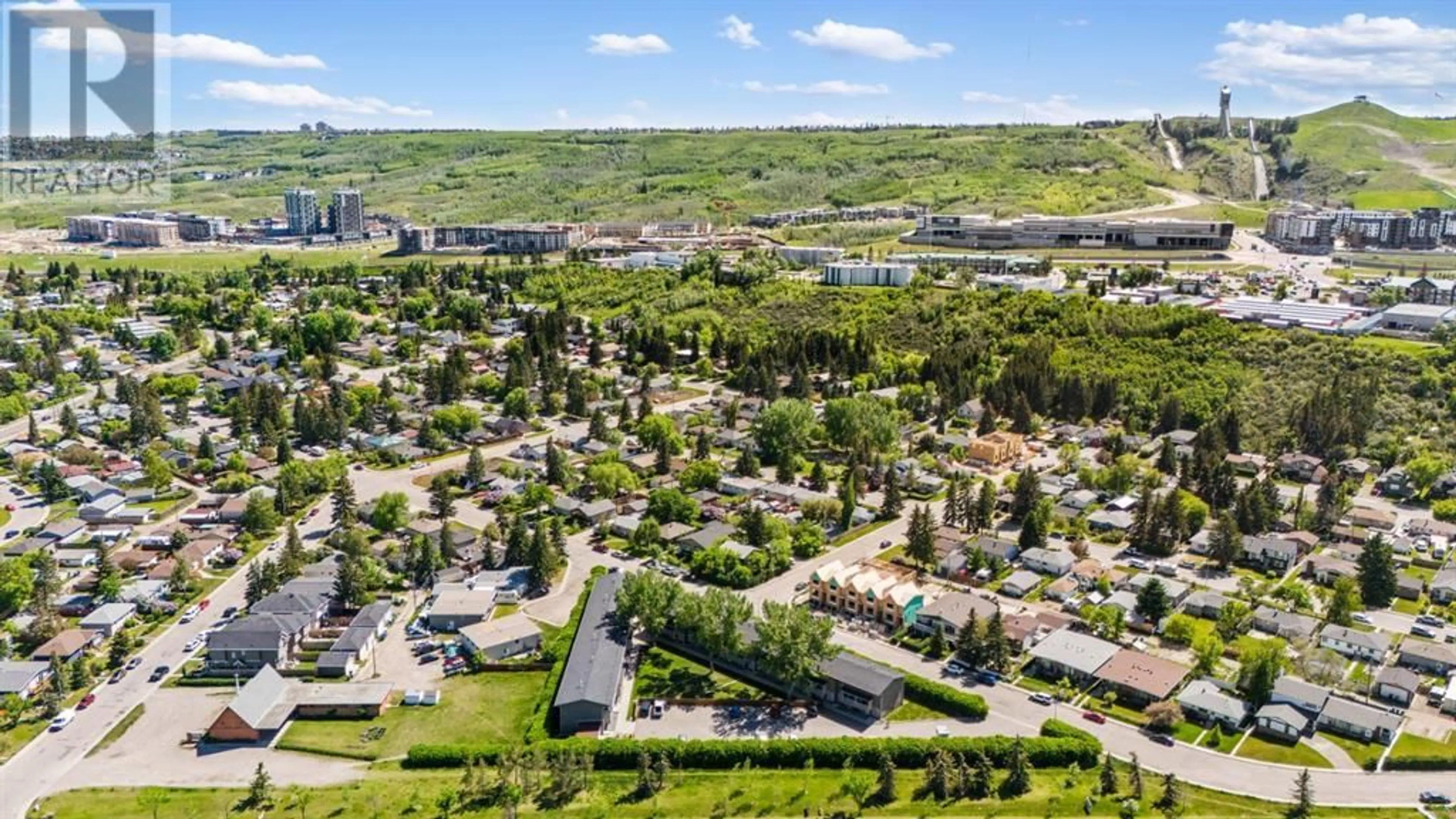 A pic from outside/outdoor area/front of a property/back of a property/a pic from drone, mountain view for 8112 36 AVENUE NORTHWEST, Calgary Alberta T3B3P3