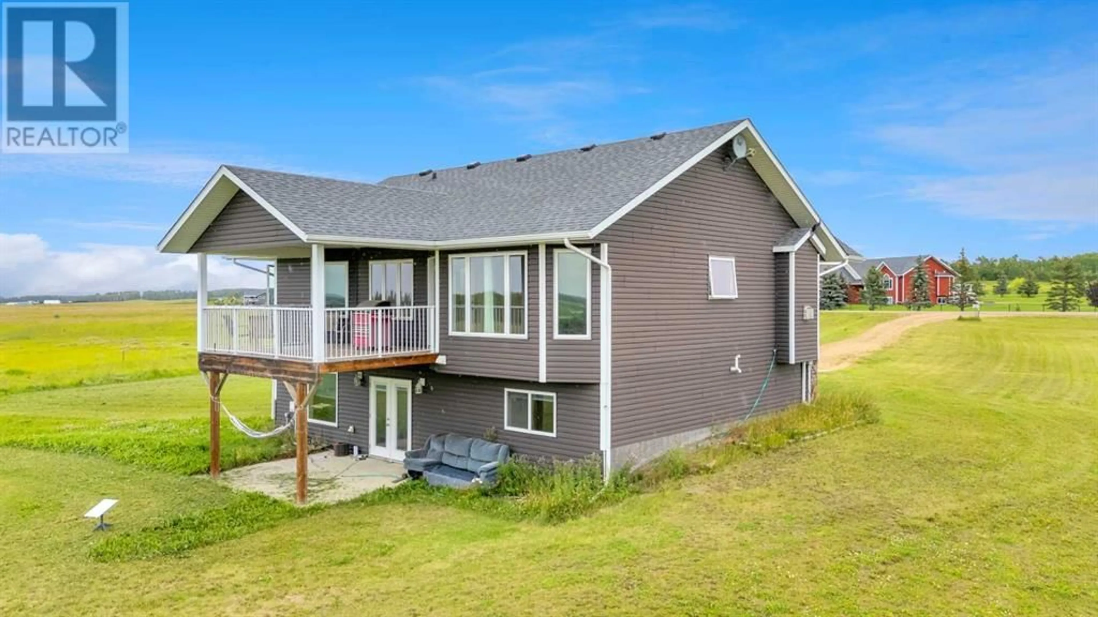 Home with vinyl exterior material, water/lake/river/ocean view for 6253050 TWP RD 424, Rural Ponoka County Alberta T4J1R3