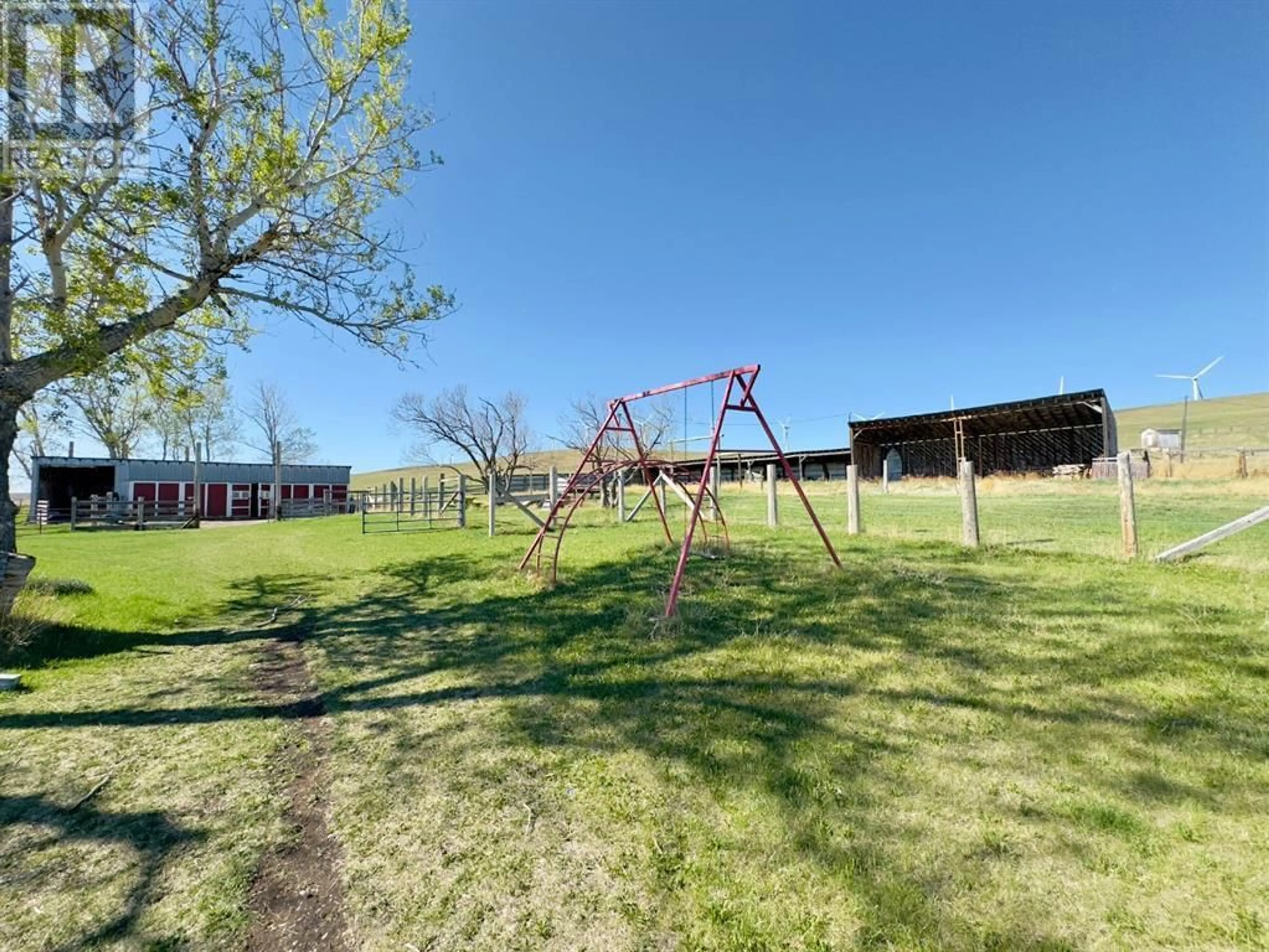 A pic from outside/outdoor area/front of a property/back of a property/a pic from drone, mountain view for 1411 TWP RD 7-3, Cowley Alberta T0K1W0