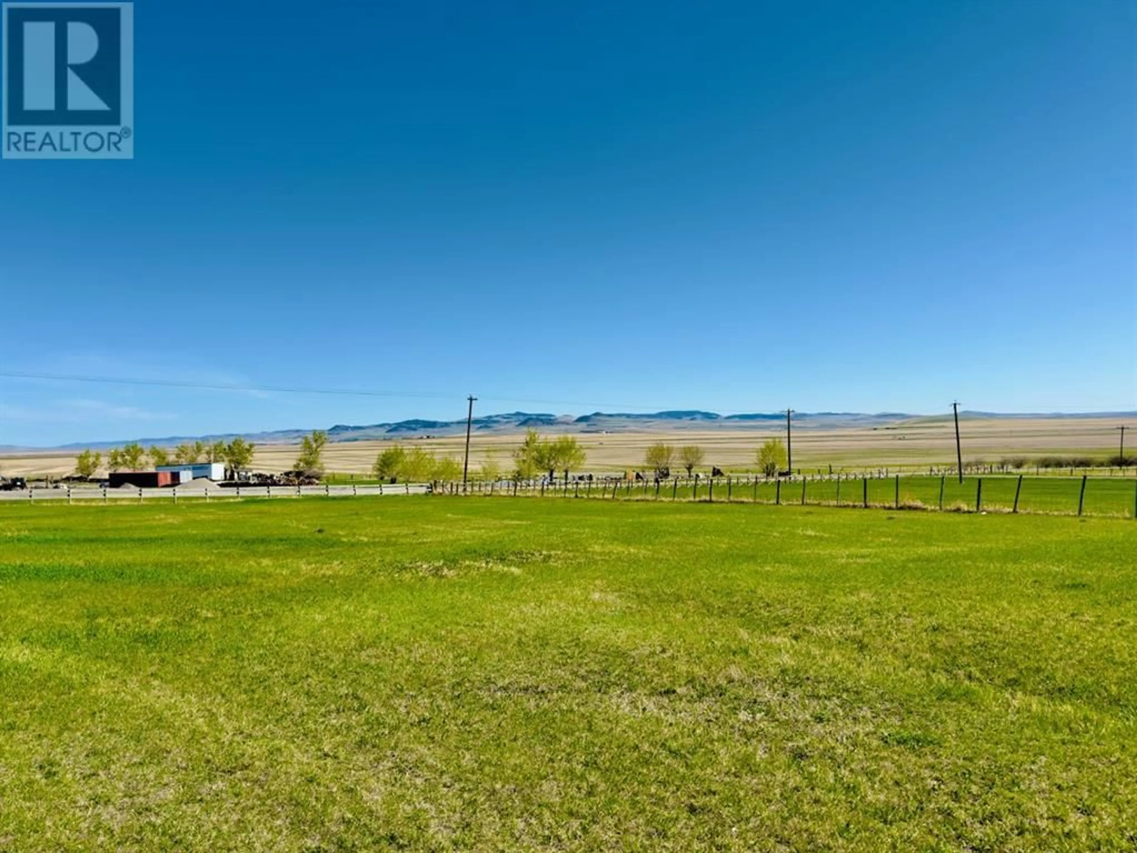 A pic from outside/outdoor area/front of a property/back of a property/a pic from drone, water/lake/river/ocean view for 1411 TWP RD 7-3, Cowley Alberta T0K1W0