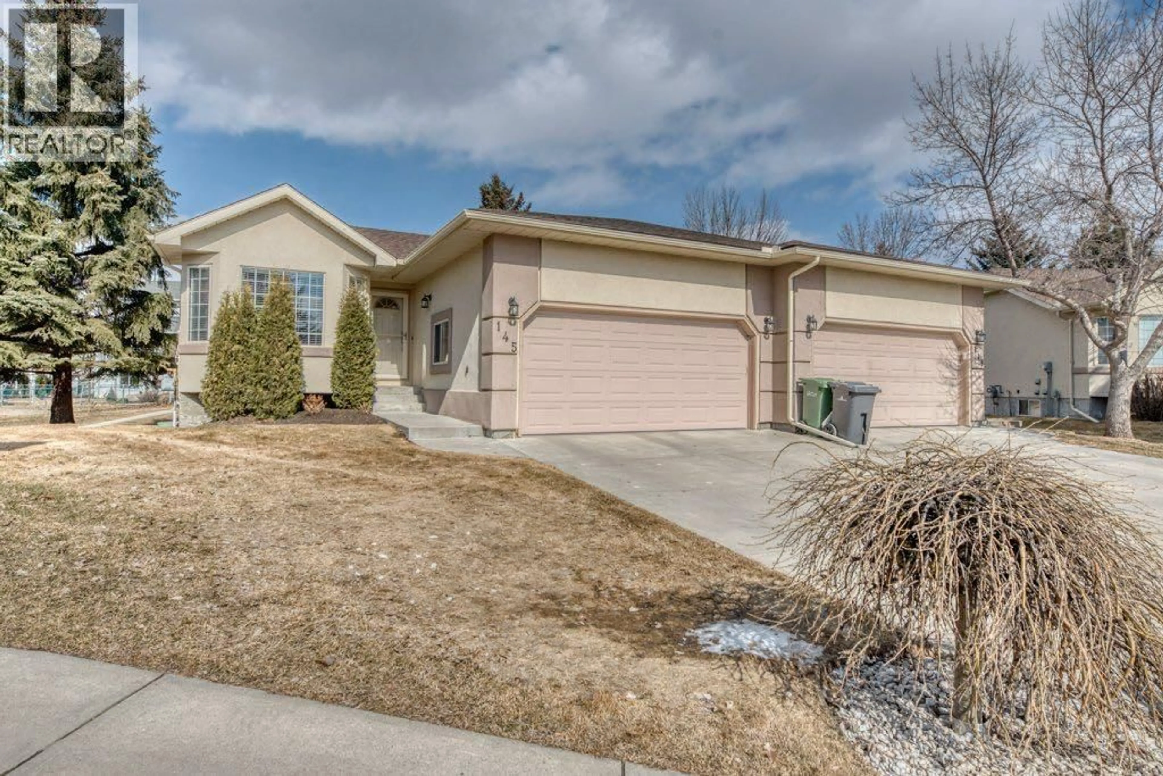 Home with vinyl exterior material, street for 145 LAKESIDE GREENS PLACE, Chestermere Alberta T1X1C4
