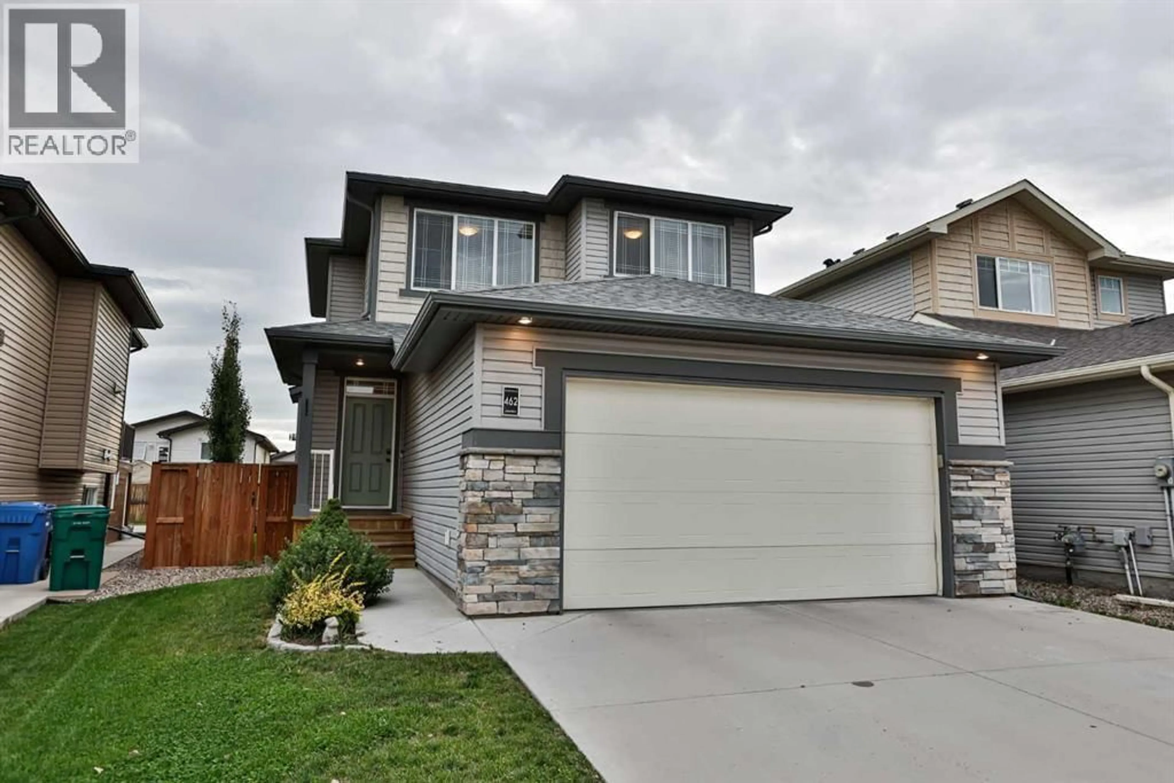 Home with brick exterior material, street for 462 MT SUNDANCE LANDING WEST, Lethbridge Alberta T1J5J9