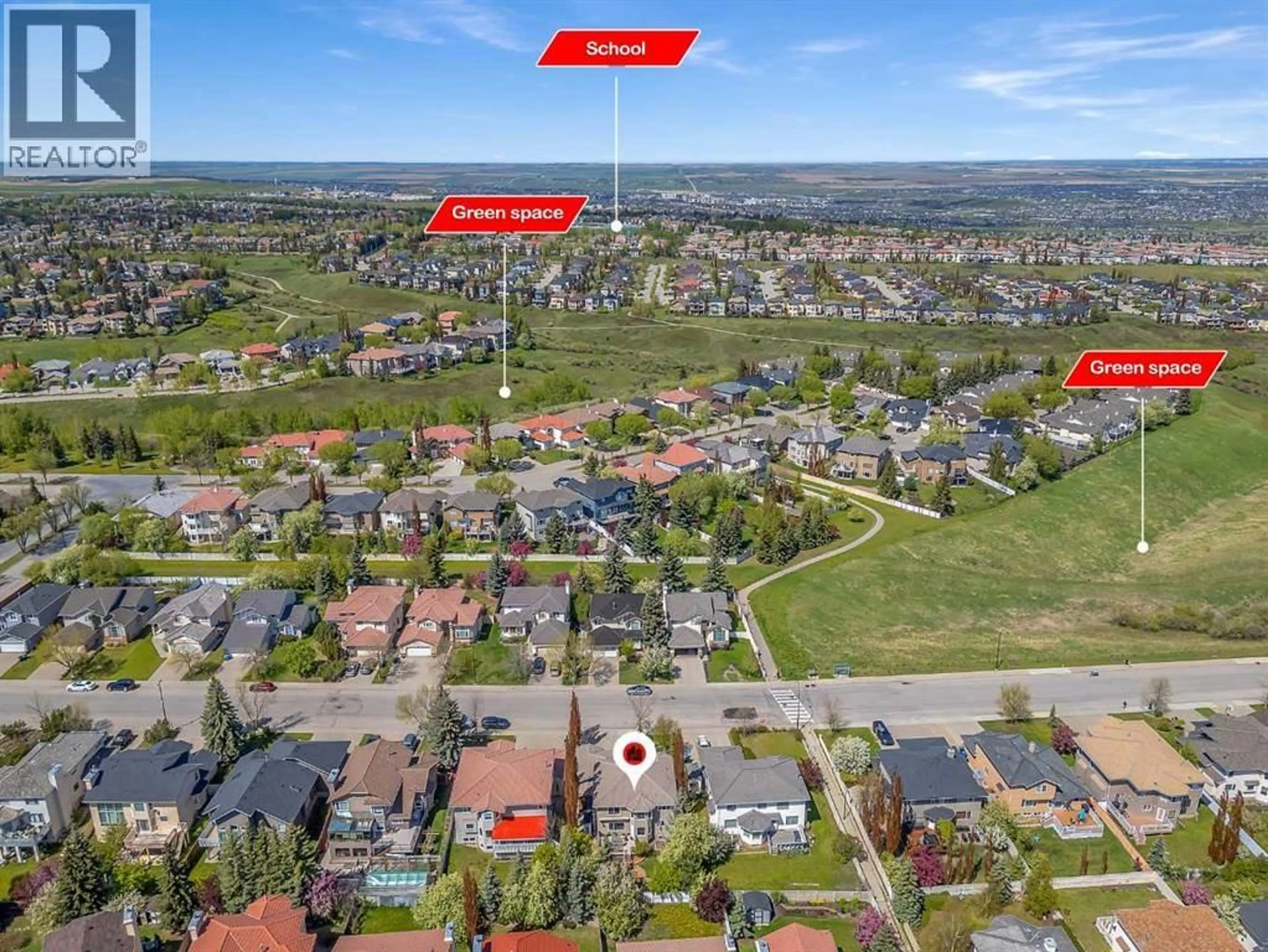 A pic from outside/outdoor area/front of a property/back of a property/a pic from drone, street for 33 EDGEVALLEY WAY NORTHWEST, Calgary Alberta T3A4X7