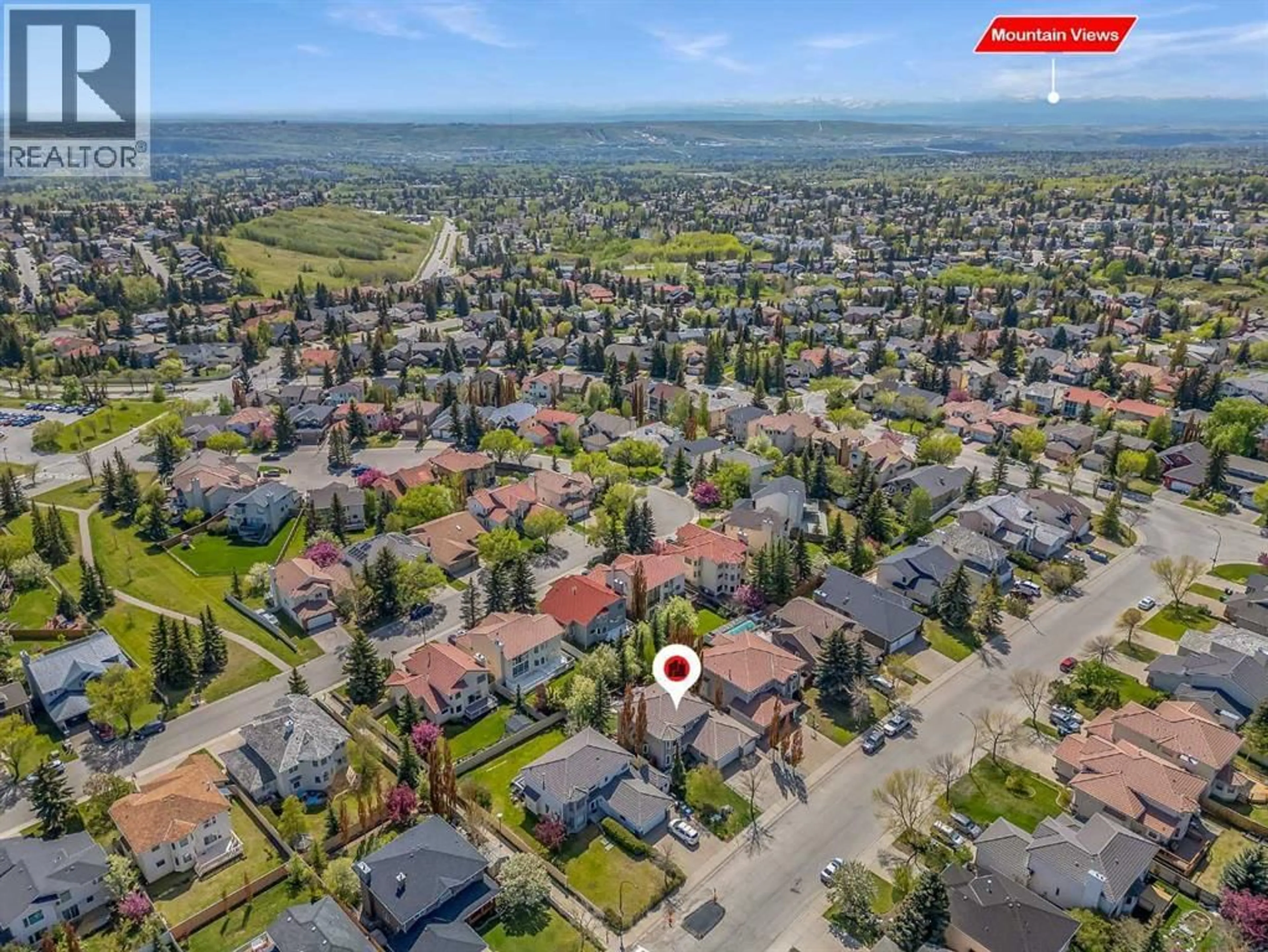 A pic from outside/outdoor area/front of a property/back of a property/a pic from drone, street for 33 EDGEVALLEY WAY NORTHWEST, Calgary Alberta T3A4X7