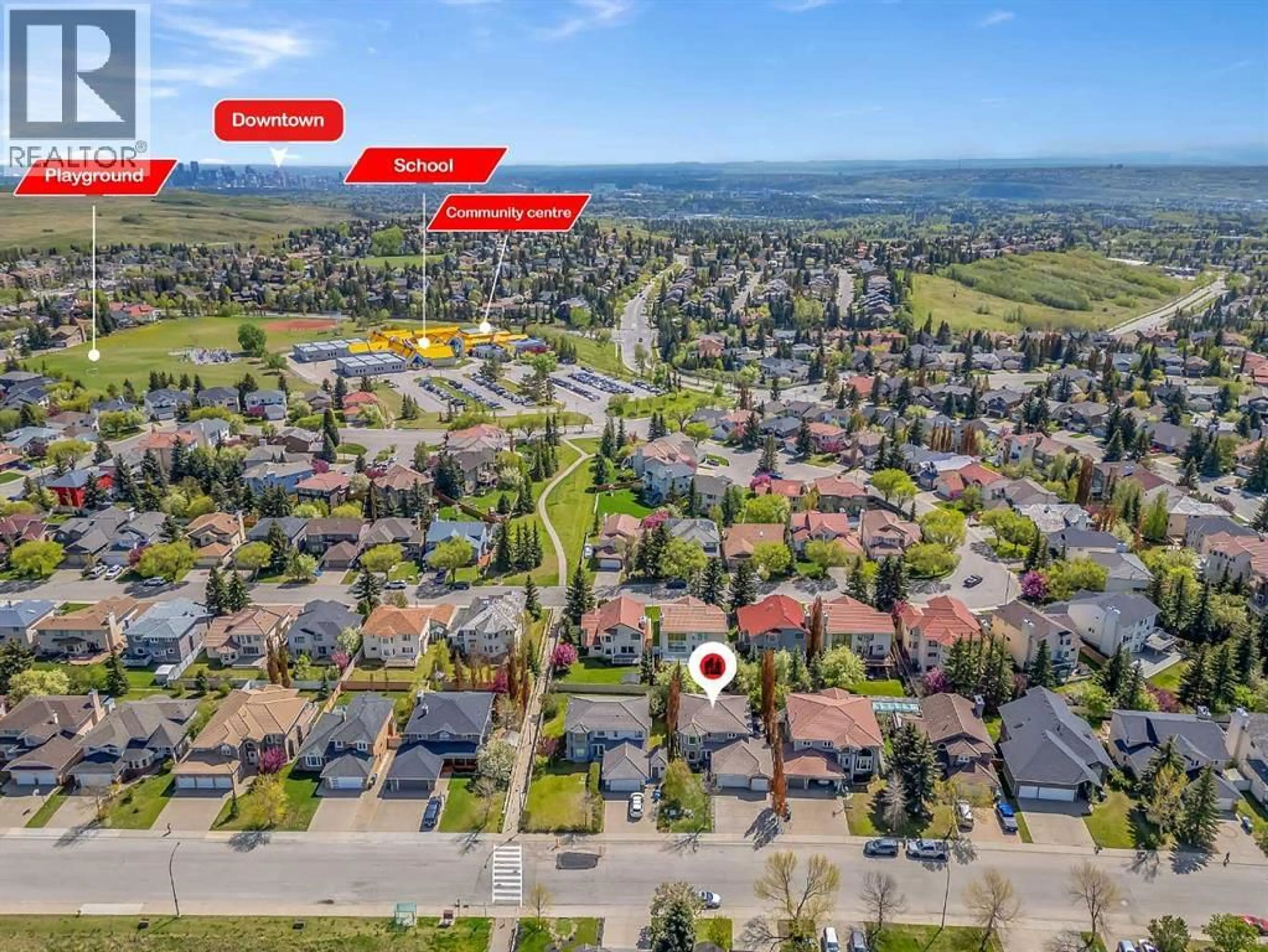 A pic from outside/outdoor area/front of a property/back of a property/a pic from drone, street for 33 EDGEVALLEY WAY NORTHWEST, Calgary Alberta T3A4X7