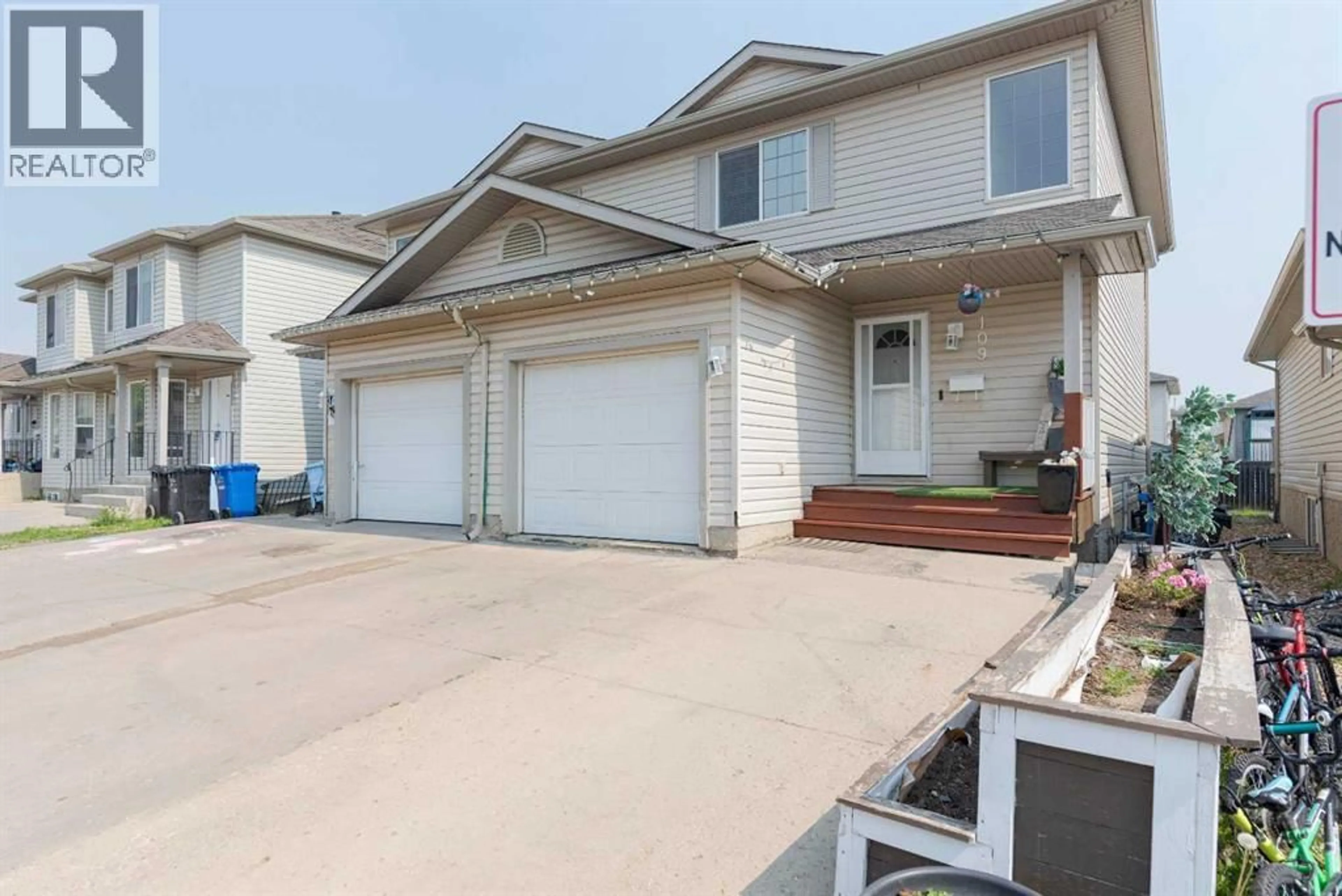 Home with vinyl exterior material, street for 109 KODIAK CRESCENT, Fort McMurray Alberta T9K2L8