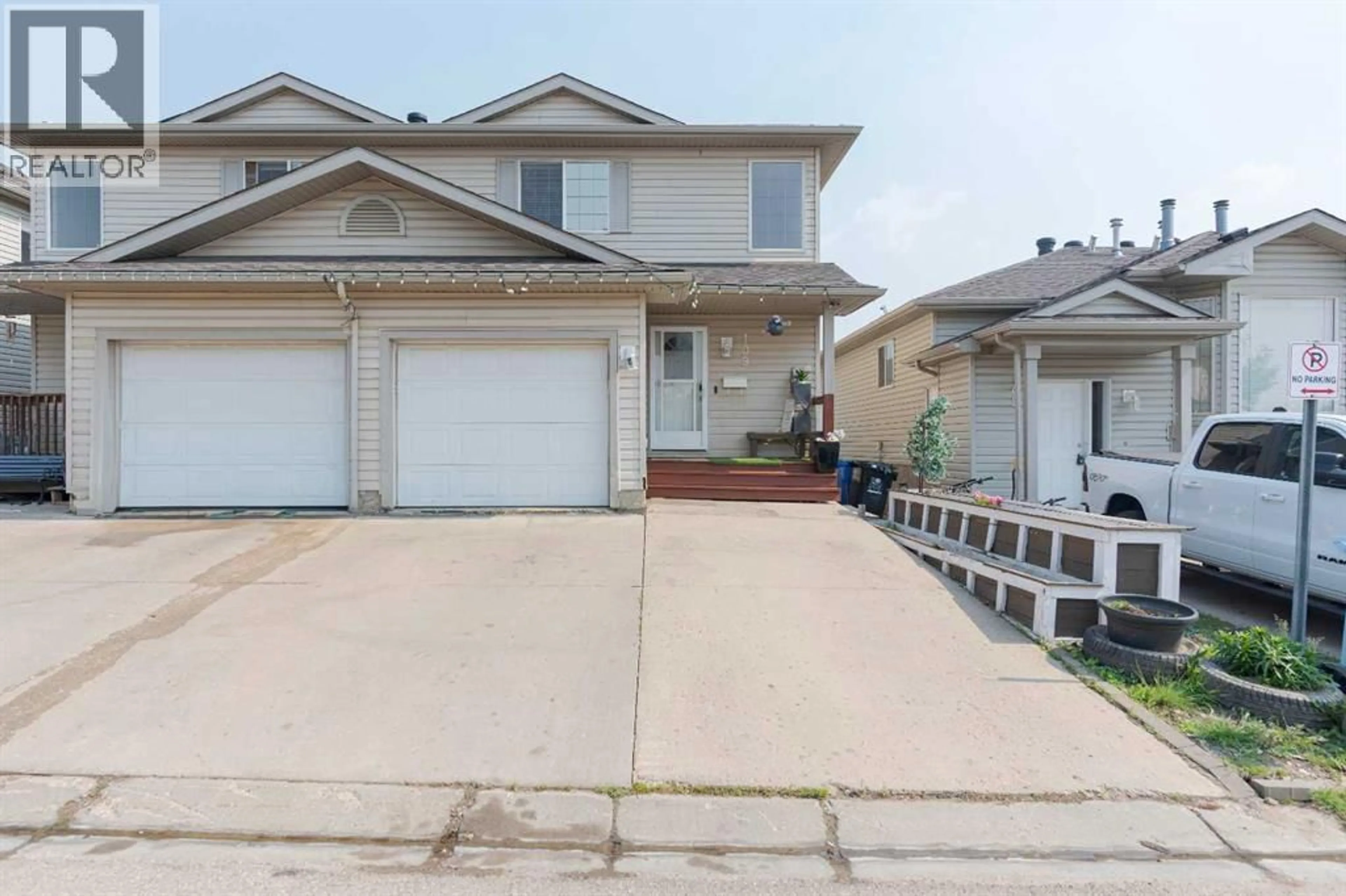 Home with vinyl exterior material, street for 109 KODIAK CRESCENT, Fort McMurray Alberta T9K2L8