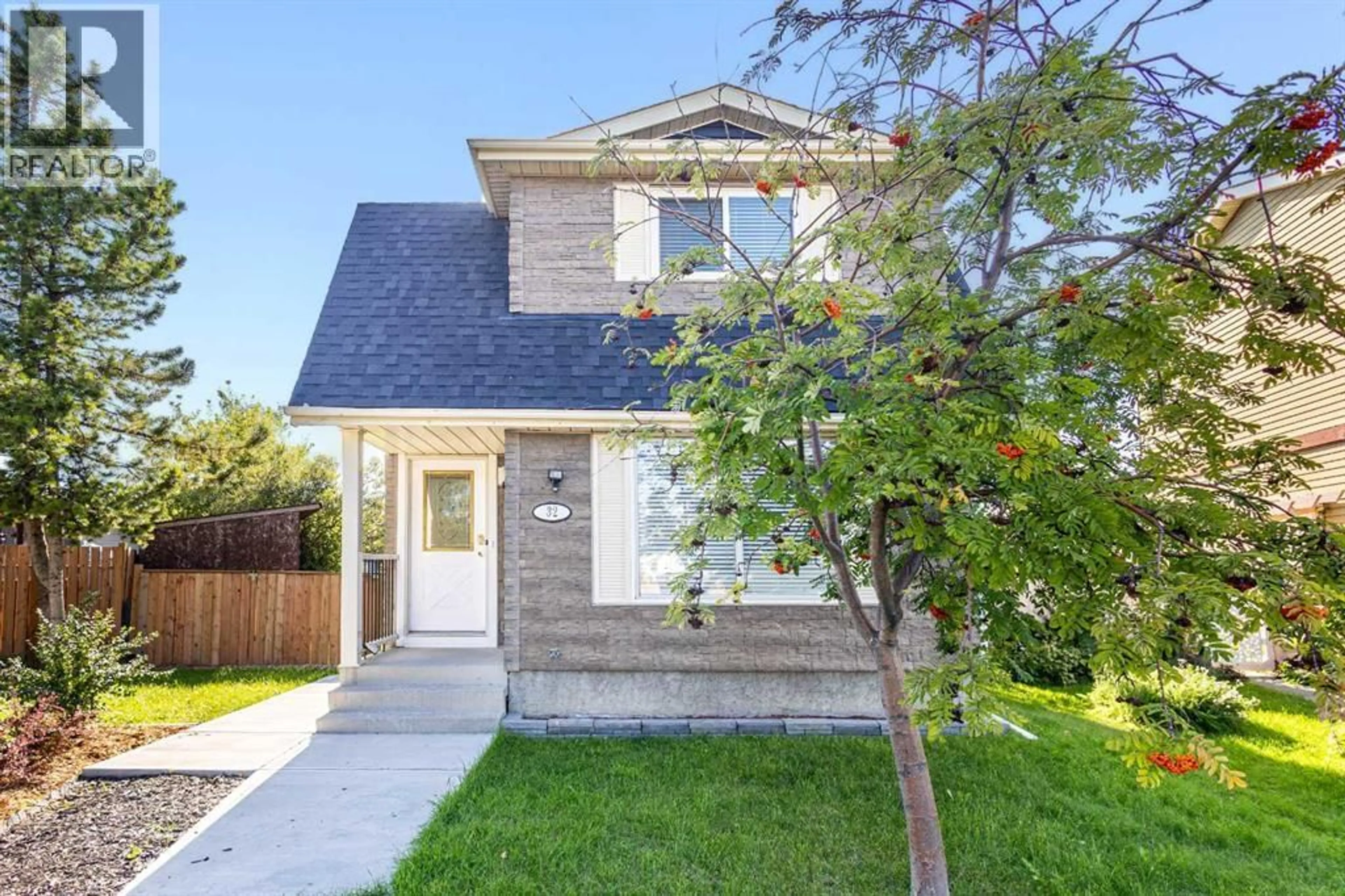 Home with brick exterior material, street for 32 ERIN MOUNT CRESCENT SOUTHEAST, Calgary Alberta T2B2S3