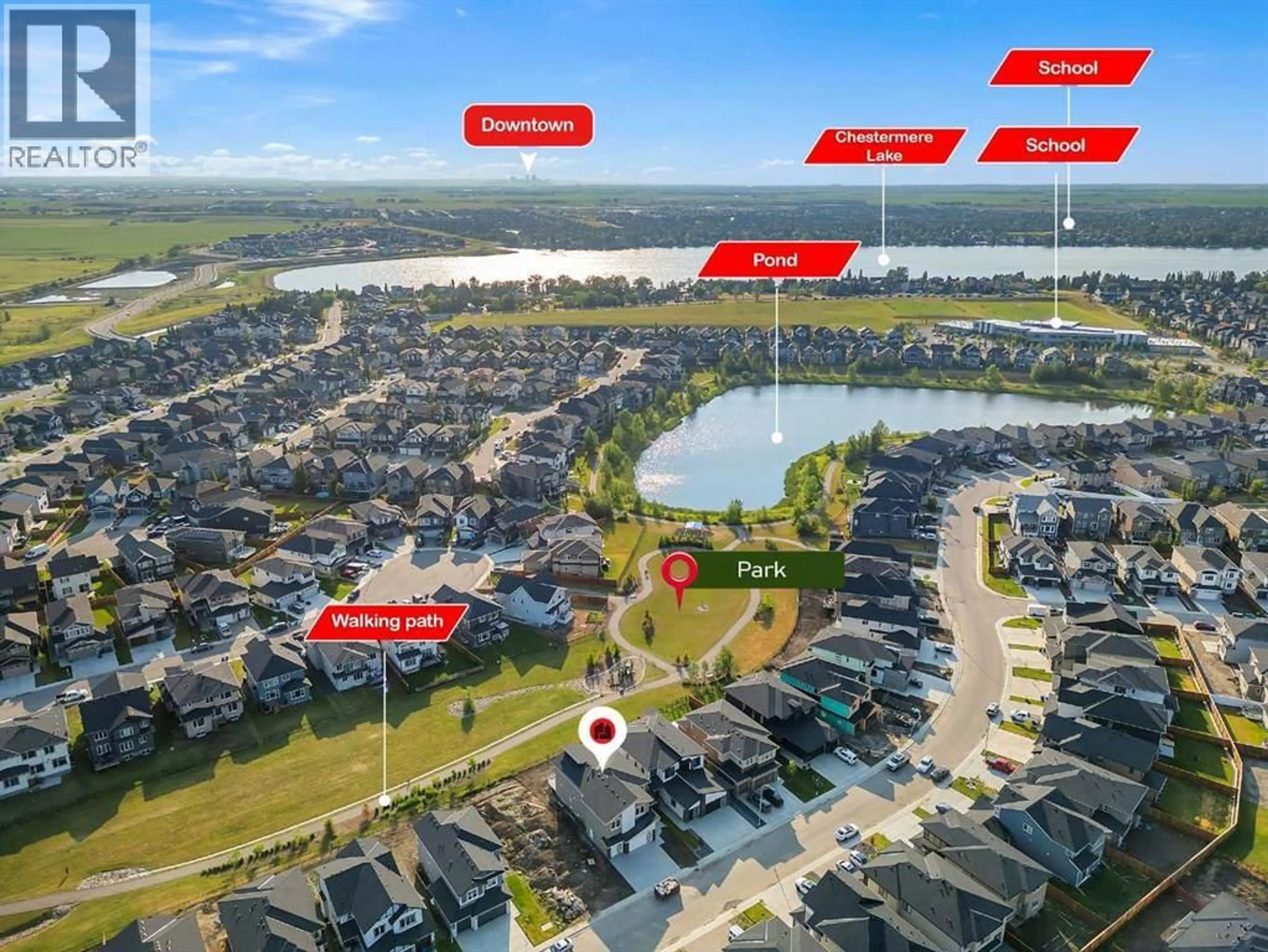 A pic from outside/outdoor area/front of a property/back of a property/a pic from drone, water/lake/river/ocean view for 218 KINNIBURGH LOOP, Chestermere Alberta T1X2S7