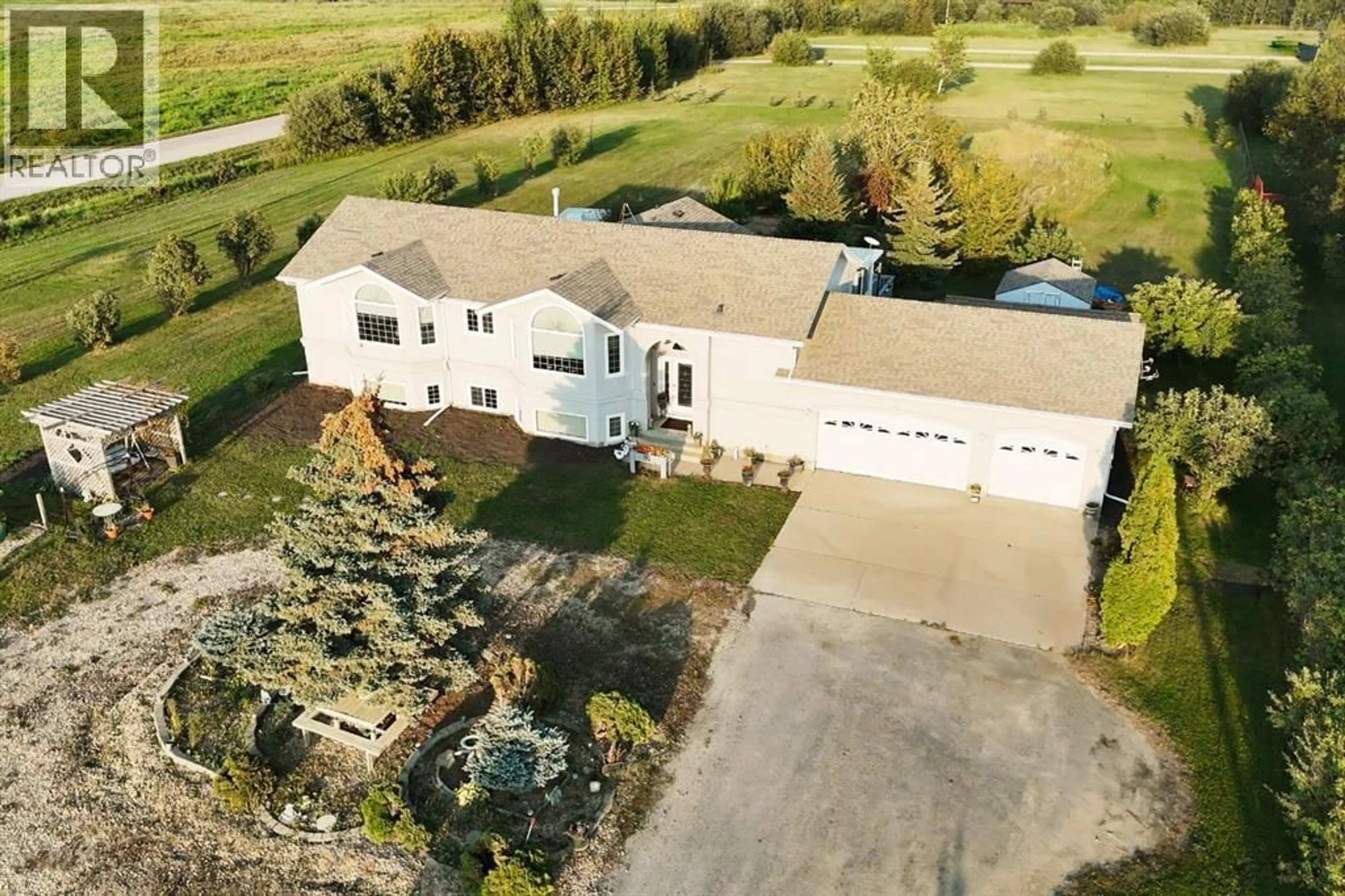 A pic from outside/outdoor area/front of a property/back of a property/a pic from drone, unknown for 431079 RANGE ROAD 254, Ponoka Alberta T4J1R2