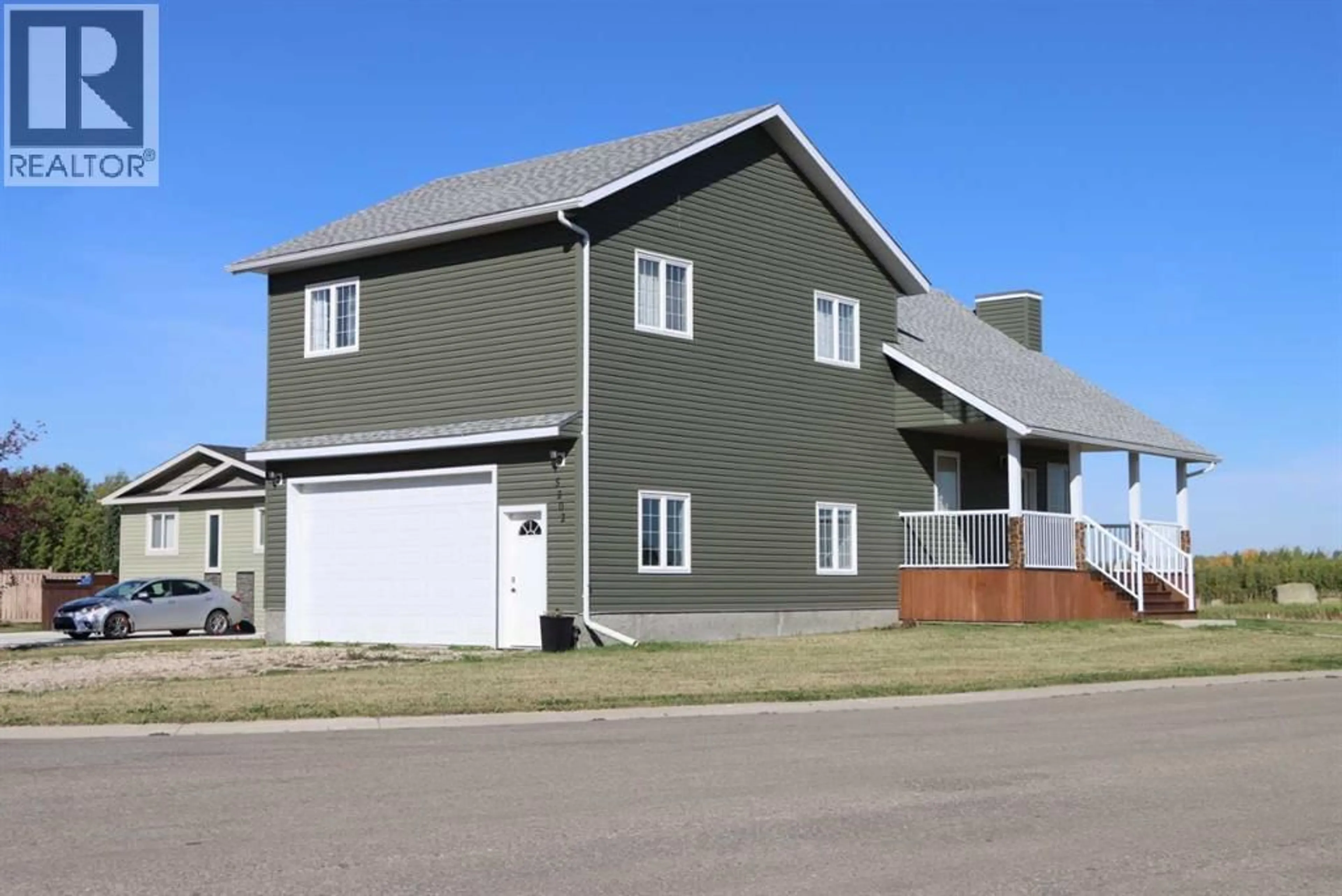Home with vinyl exterior material, street for 5202 53 AVENUE, Valleyview Alberta T0H3N0