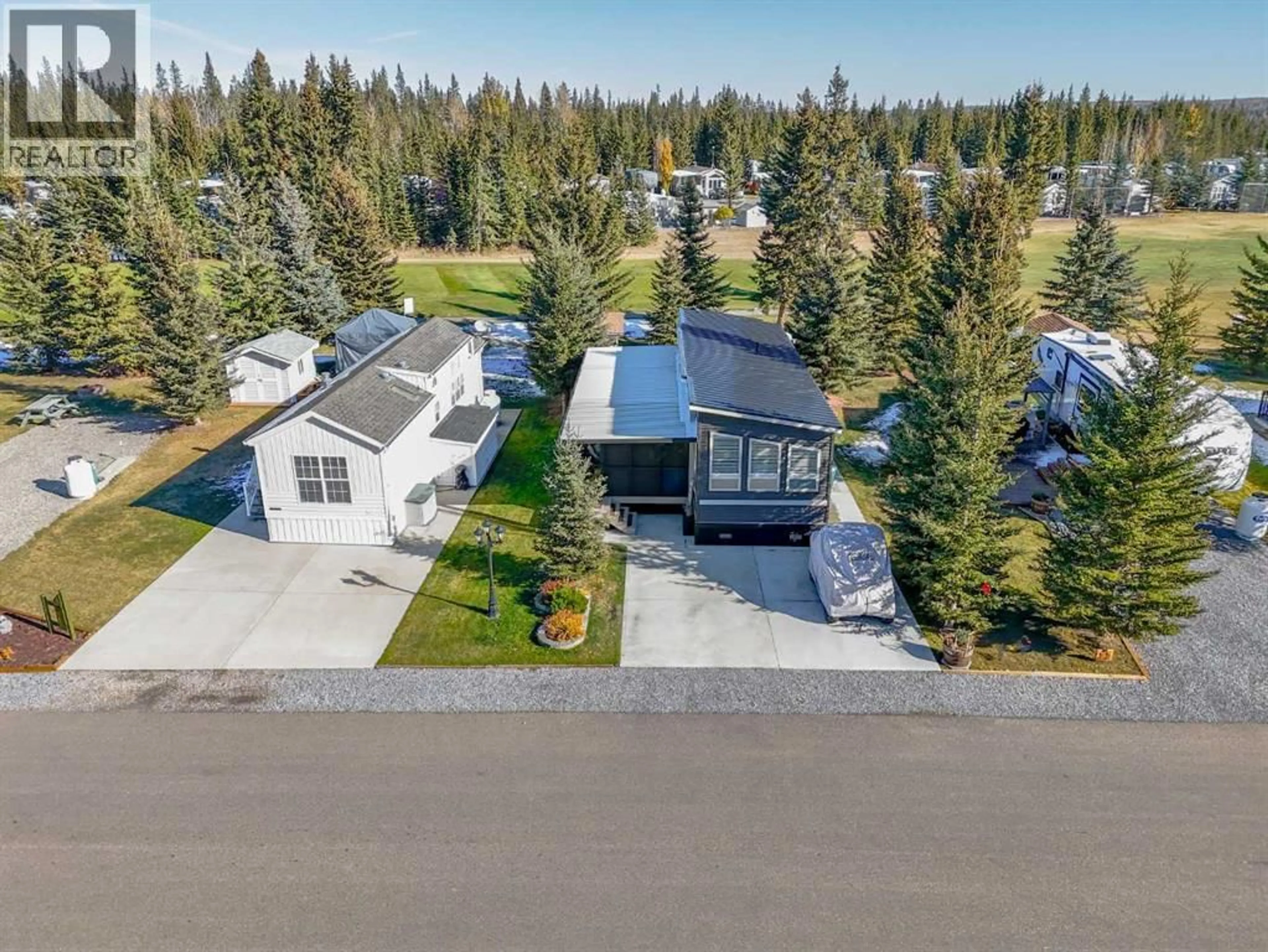 A pic from outside/outdoor area/front of a property/back of a property/a pic from drone, unknown for 32379 RANGE ROAD 55, Rural Mountain View County Alberta T0M1X0