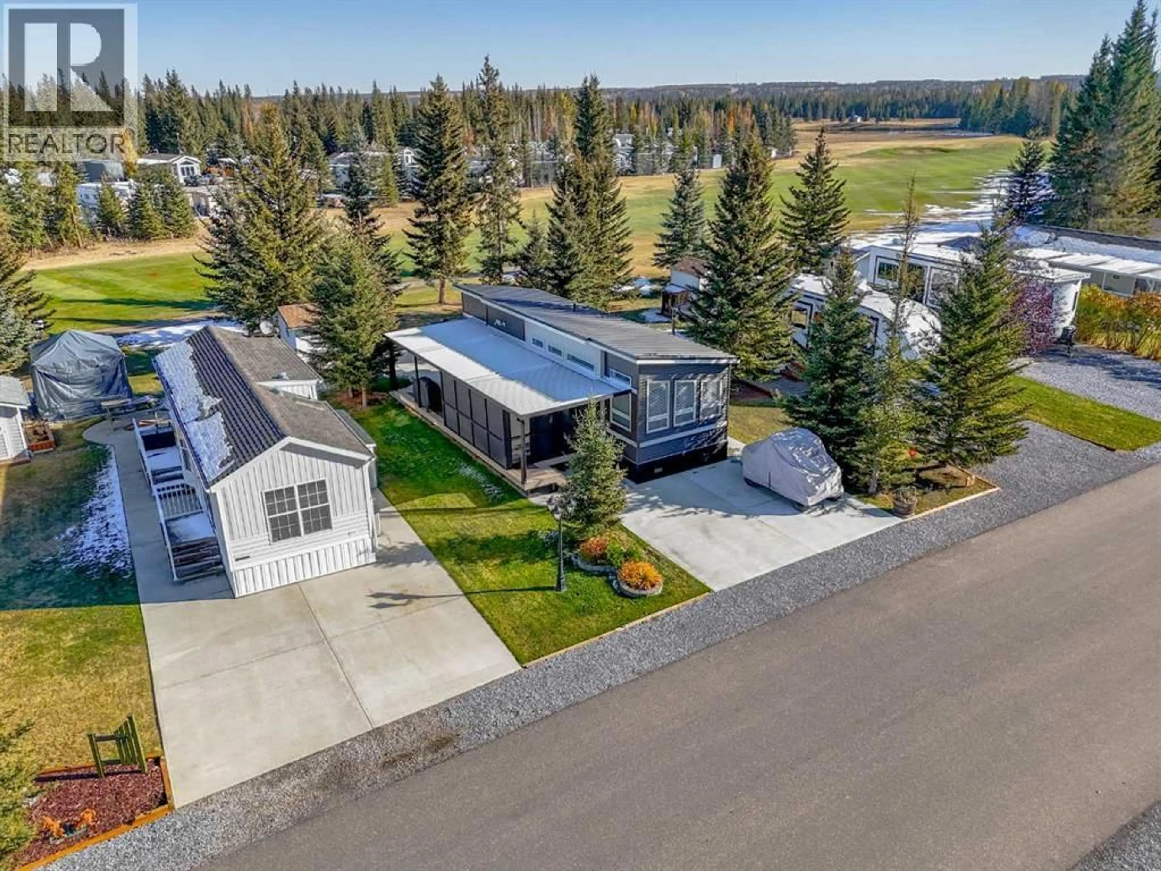 A pic from outside/outdoor area/front of a property/back of a property/a pic from drone, unknown for 32379 RANGE ROAD 55, Rural Mountain View County Alberta T0M1X0