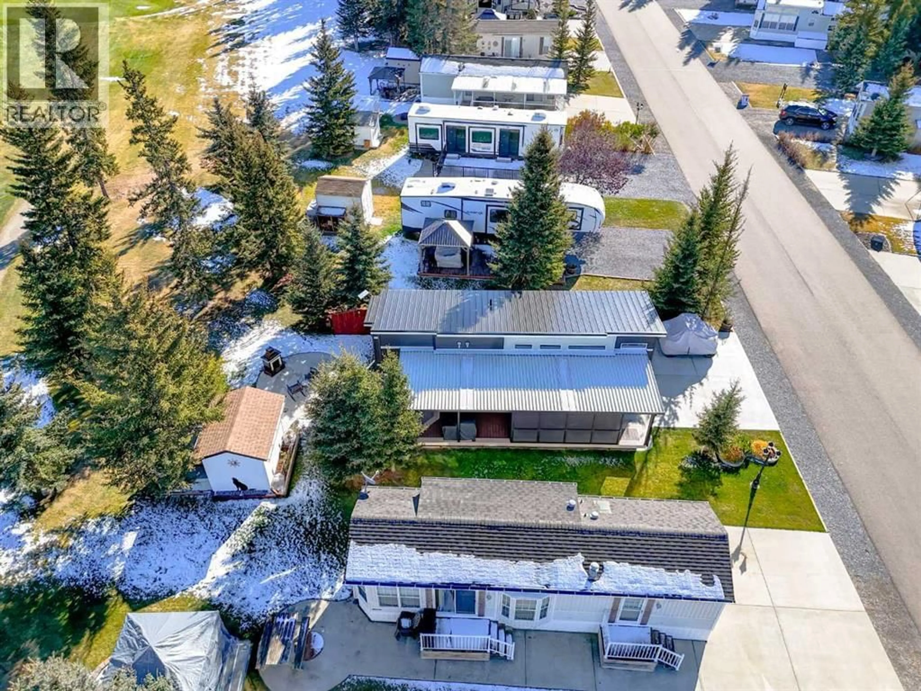 A pic from outside/outdoor area/front of a property/back of a property/a pic from drone, unknown for 32379 RANGE ROAD 55, Rural Mountain View County Alberta T0M1X0