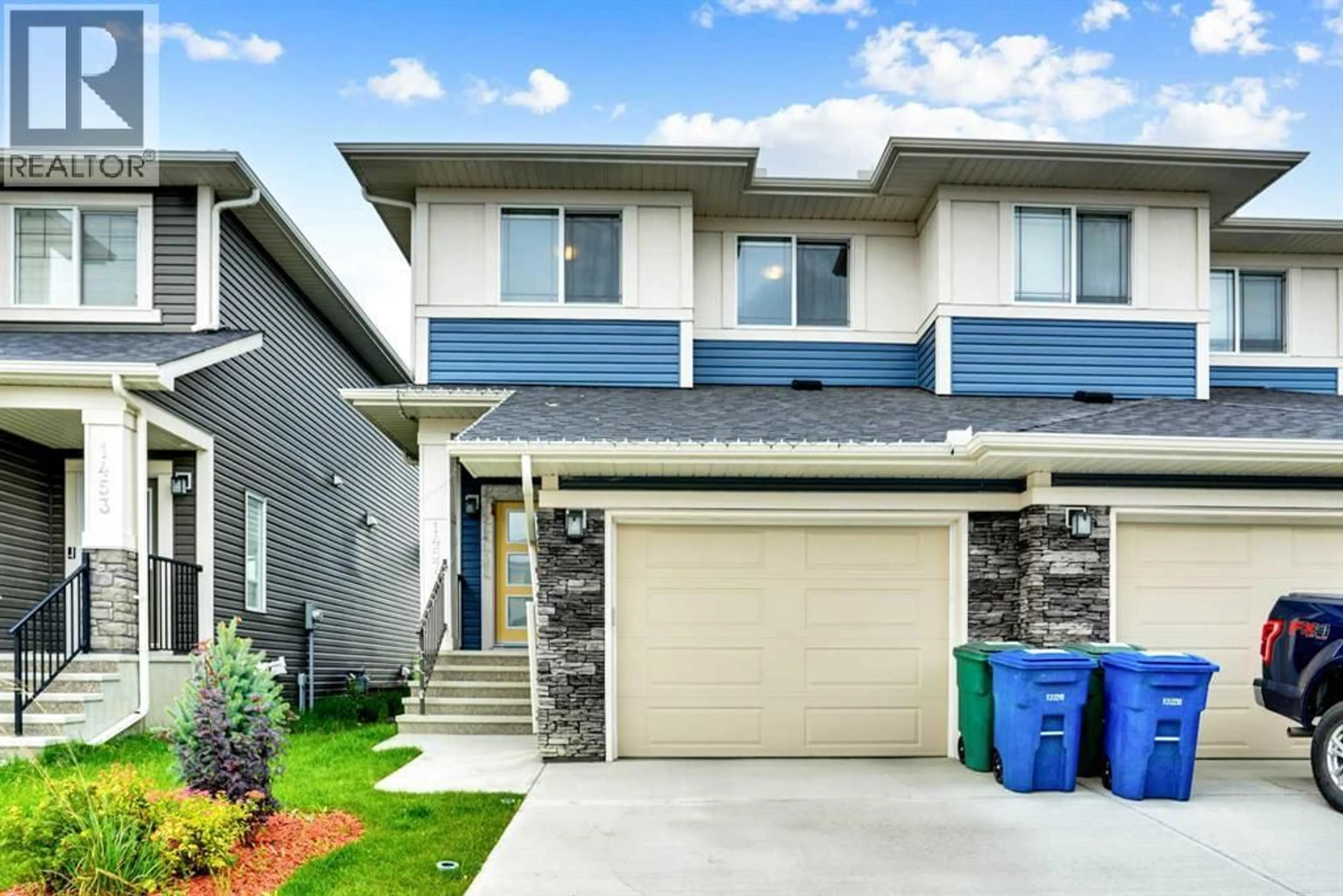 Home with vinyl exterior material, street for 1457 BAYVIEW POINT SOUTHWEST, Airdrie Alberta T4B5K2