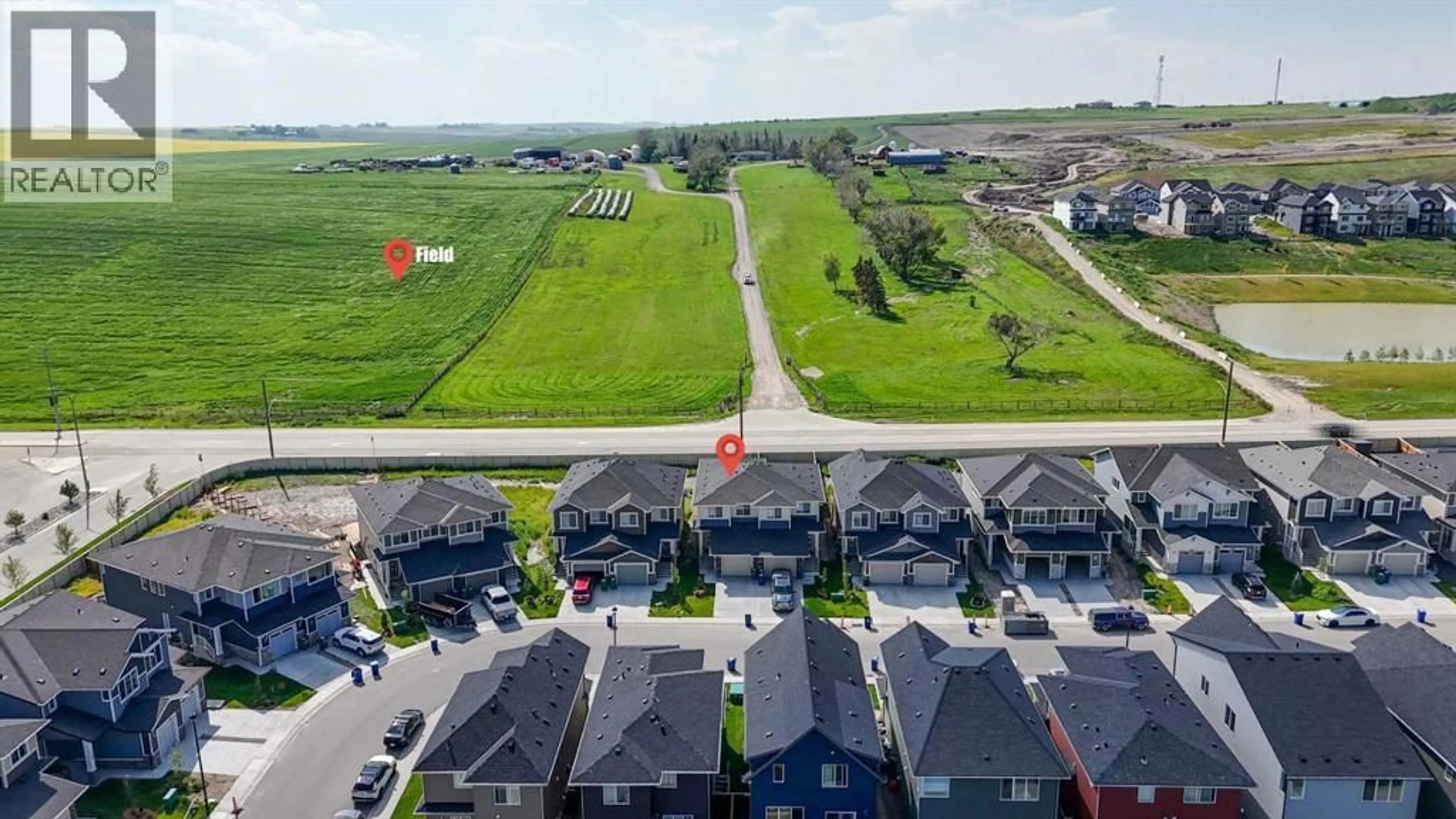 A pic from outside/outdoor area/front of a property/back of a property/a pic from drone, street for 1457 BAYVIEW POINT SOUTHWEST, Airdrie Alberta T4B5K2