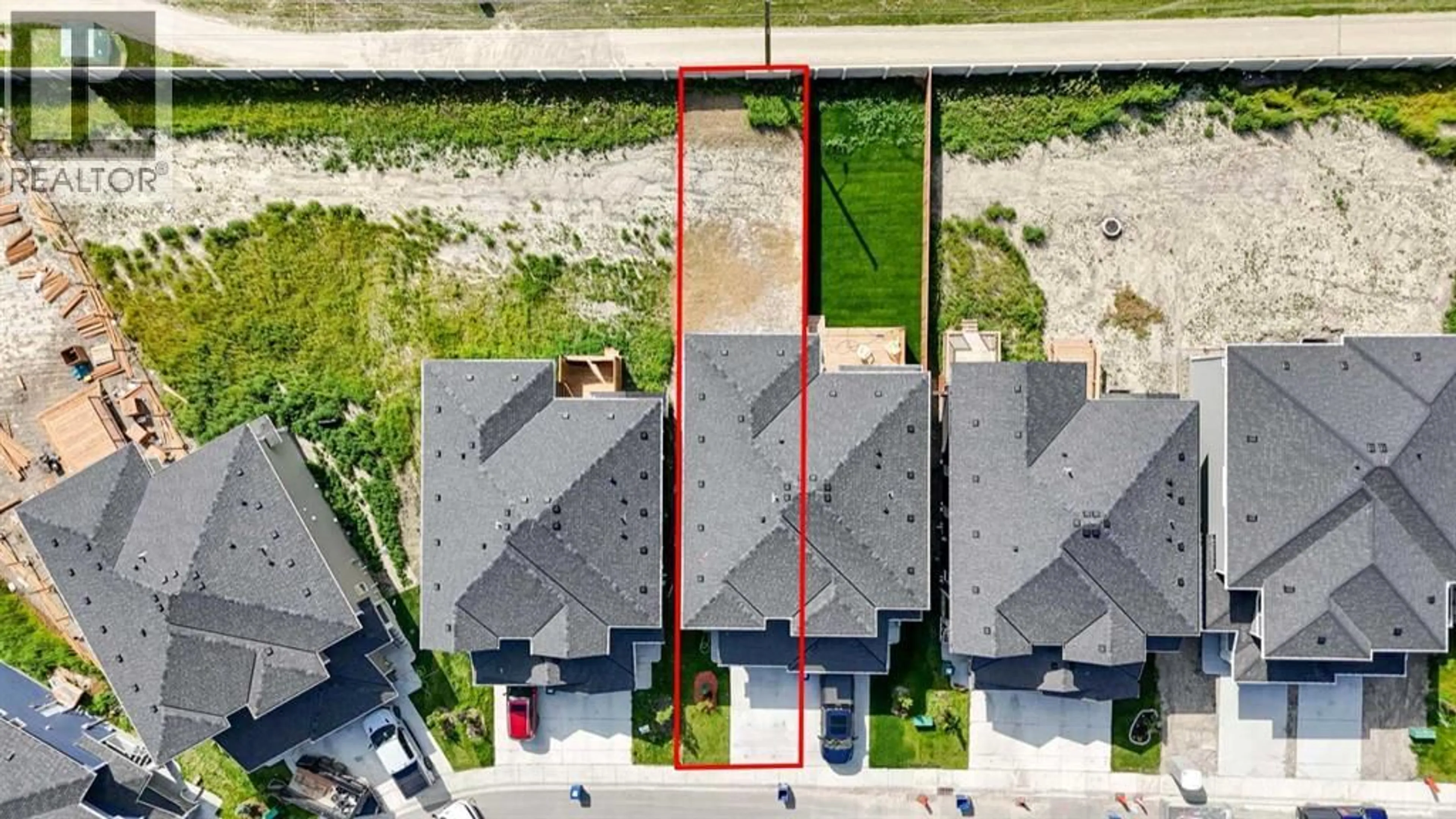 A pic from outside/outdoor area/front of a property/back of a property/a pic from drone, street for 1457 BAYVIEW POINT SOUTHWEST, Airdrie Alberta T4B5K2