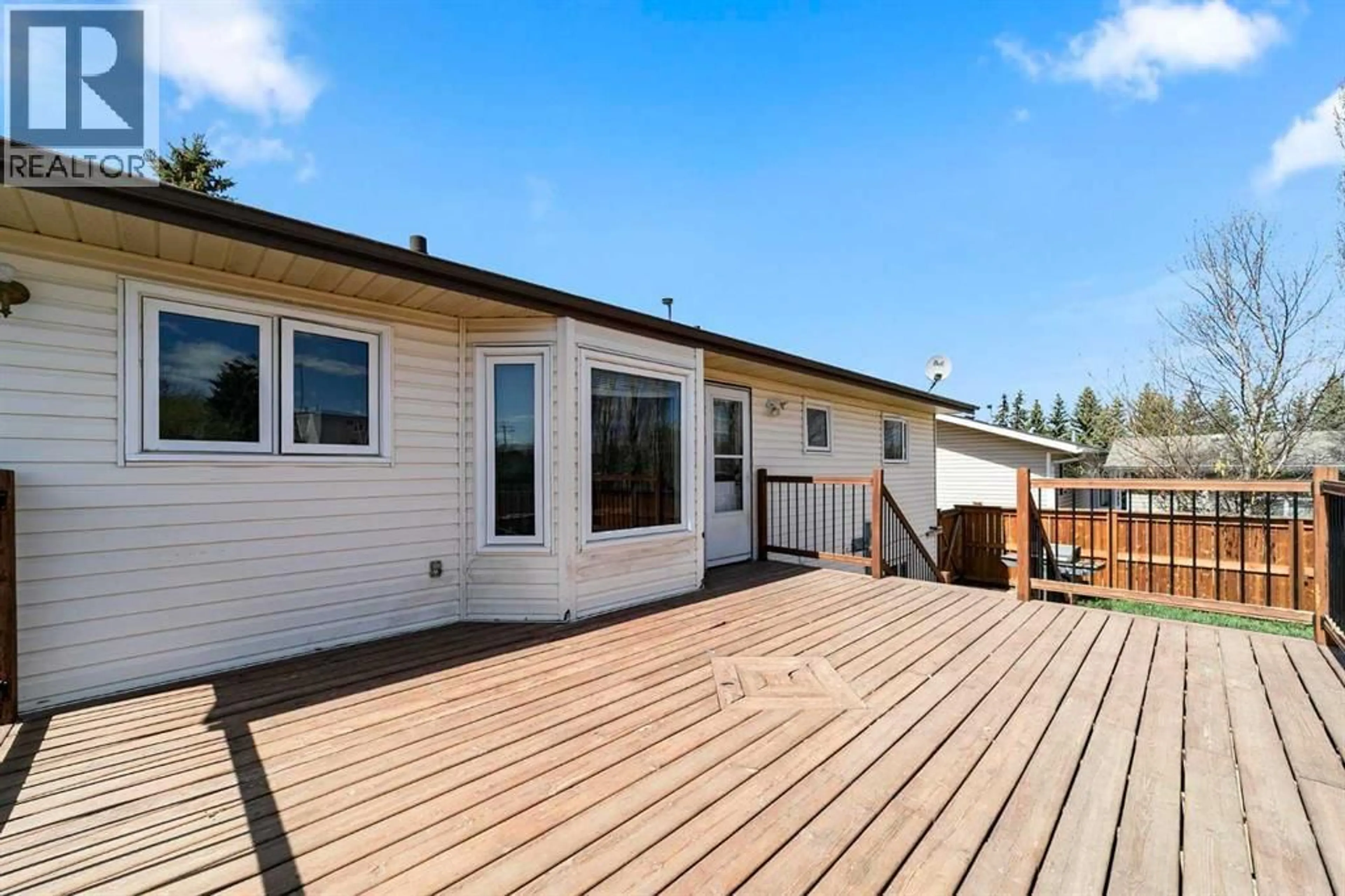 Home with vinyl exterior material, mountain view for 5419 53 STREET, Camrose Alberta T4V4N6