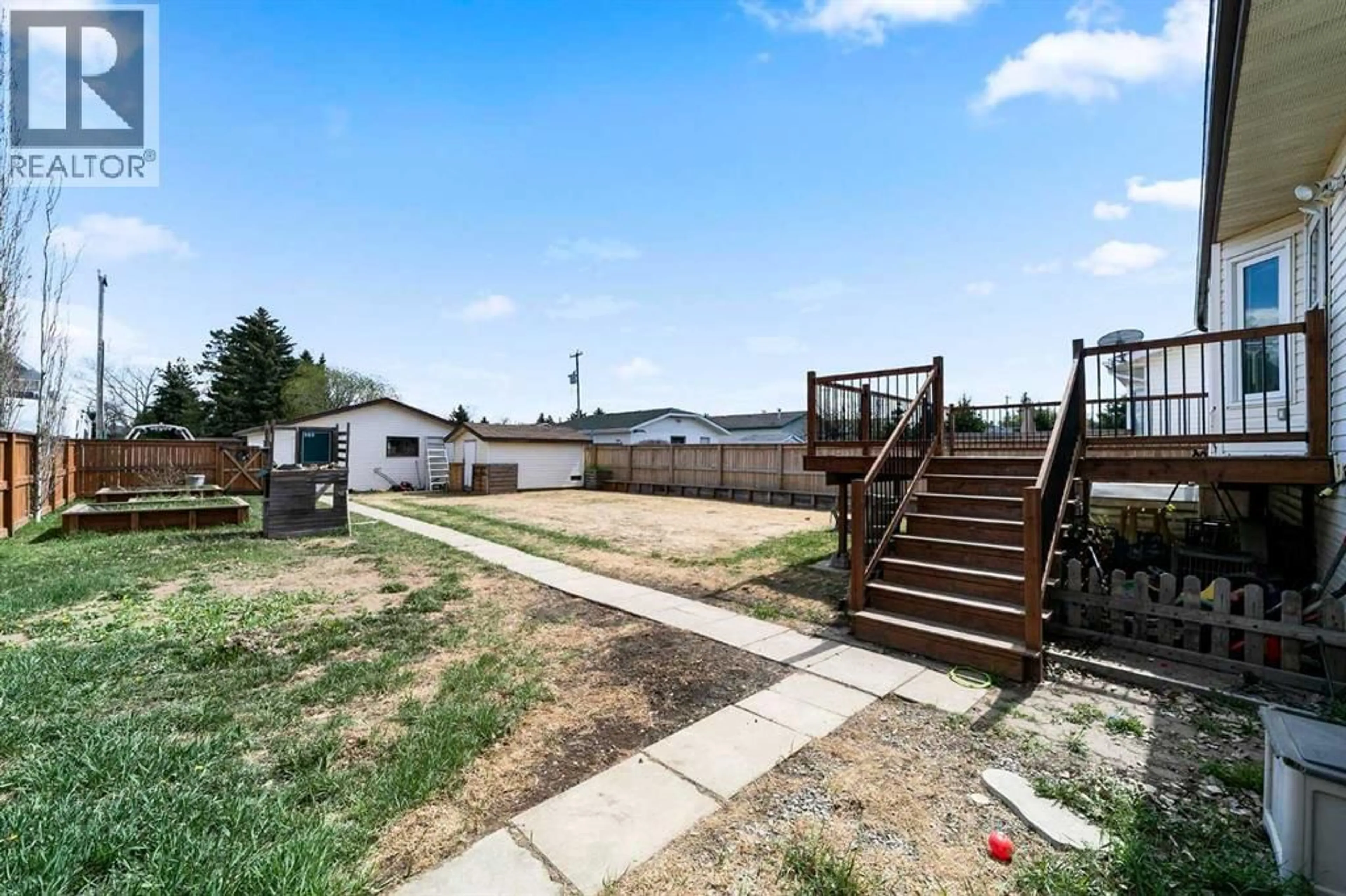 A pic from outside/outdoor area/front of a property/back of a property/a pic from drone, unknown for 5419 53 STREET, Camrose Alberta T4V4N6