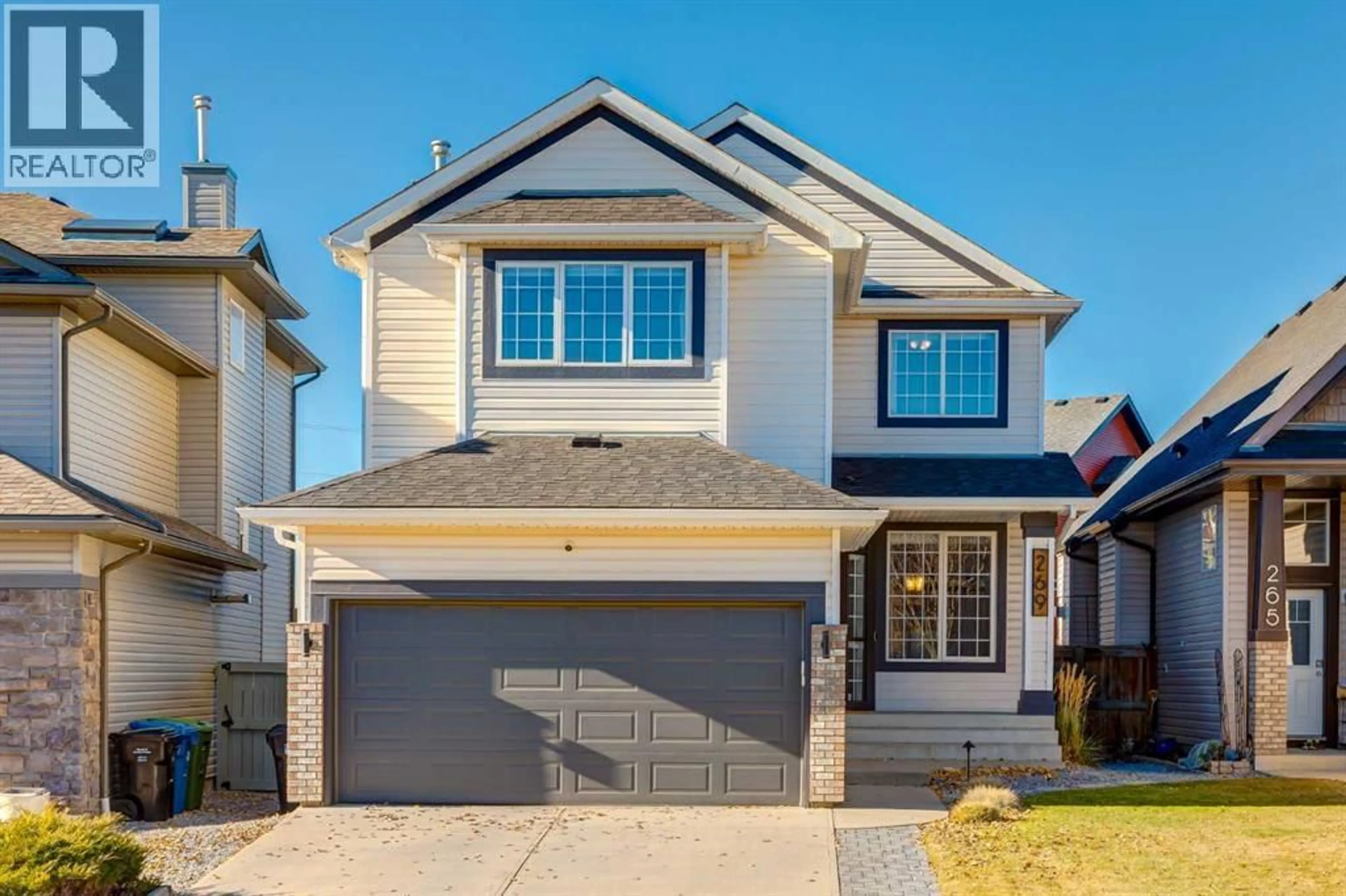 Home with vinyl exterior material, street for 269 TUSCANY RIDGE HEIGHTS NORTHWEST, Calgary Alberta T3L3B8