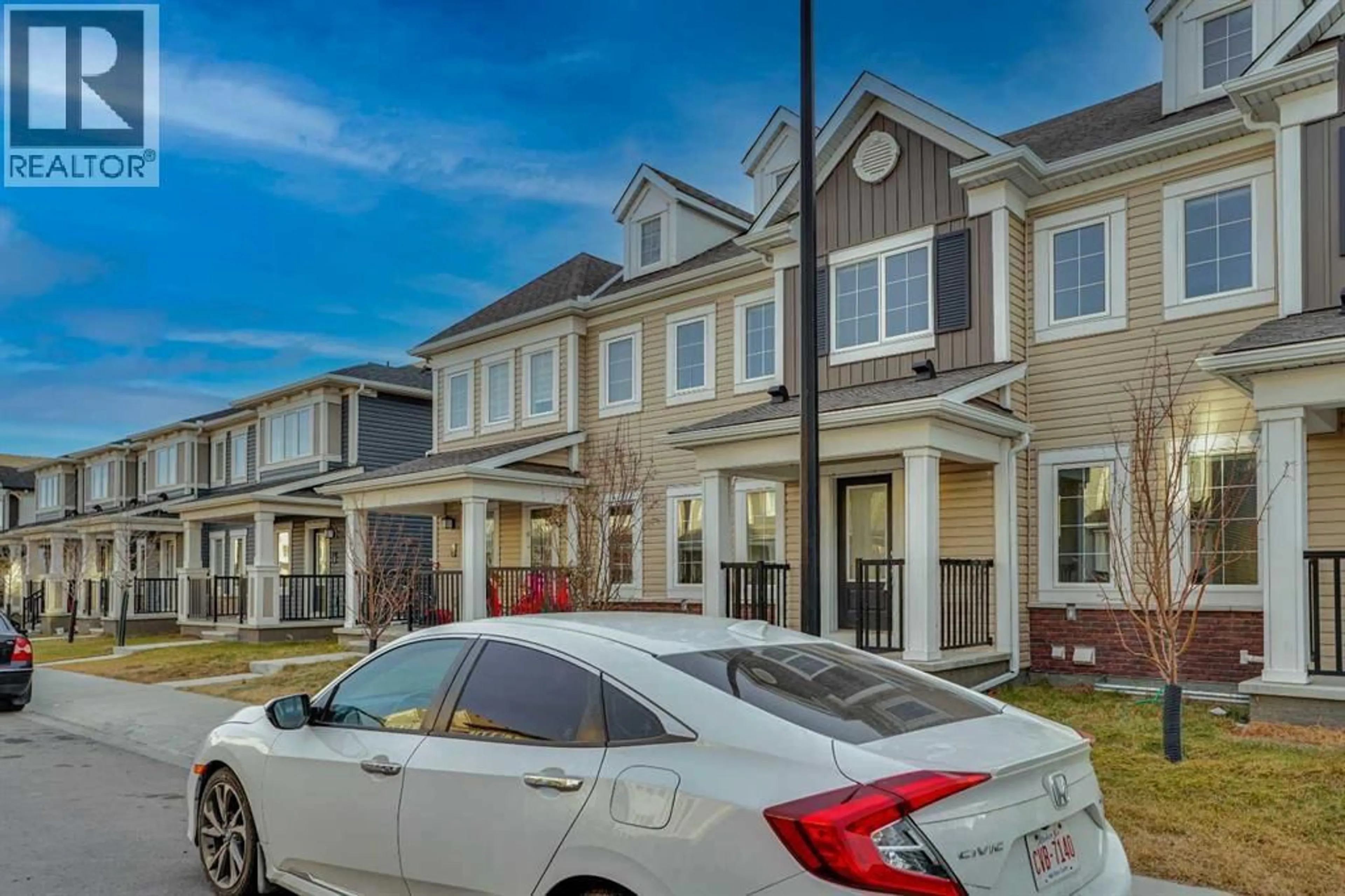 Home with vinyl exterior material, street for 158 CITYSIDE GROVE NORTHEAST, Calgary Alberta T3N1C9