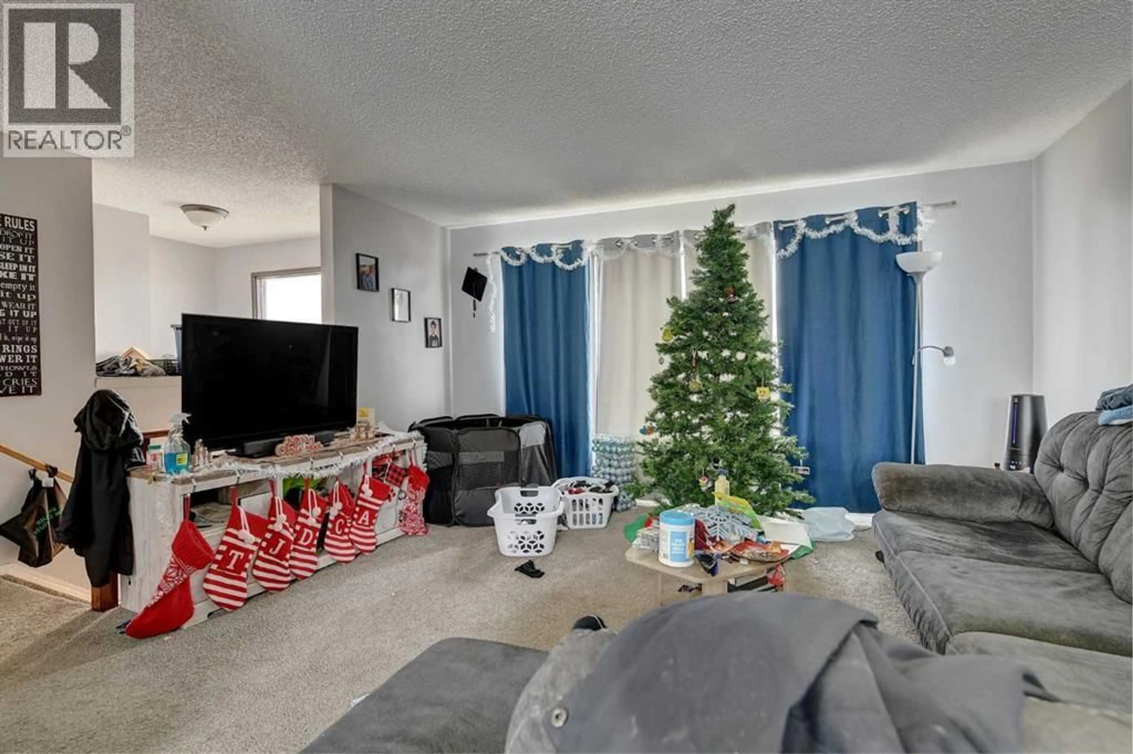 Living room with furniture, unknown for 9401 122 AVENUE, Grande Prairie Alberta T8V5V6