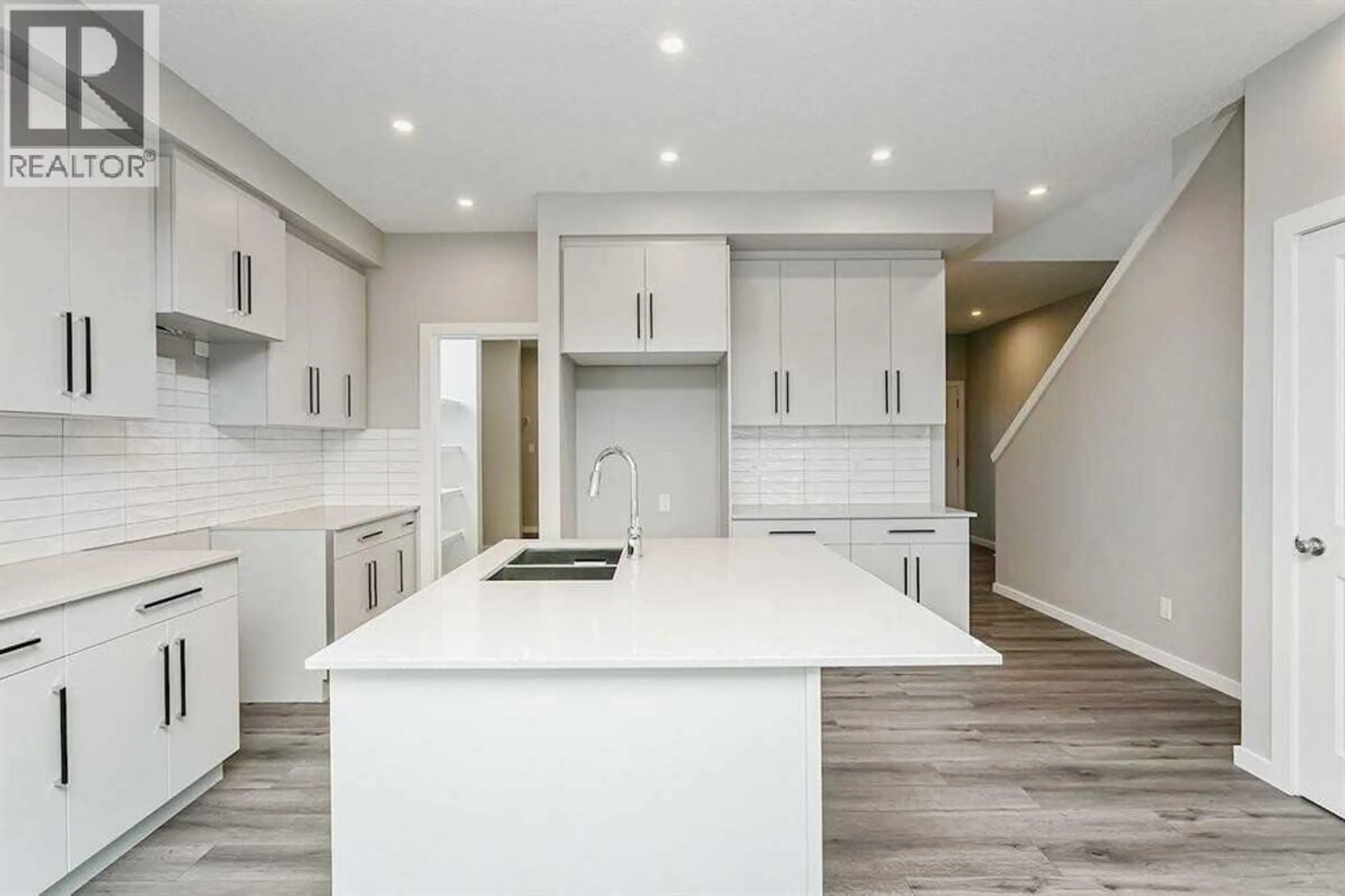 Open concept kitchen, unknown for 21 HEARTWOOD LANE SOUTHEAST, Calgary Alberta T3M2K1