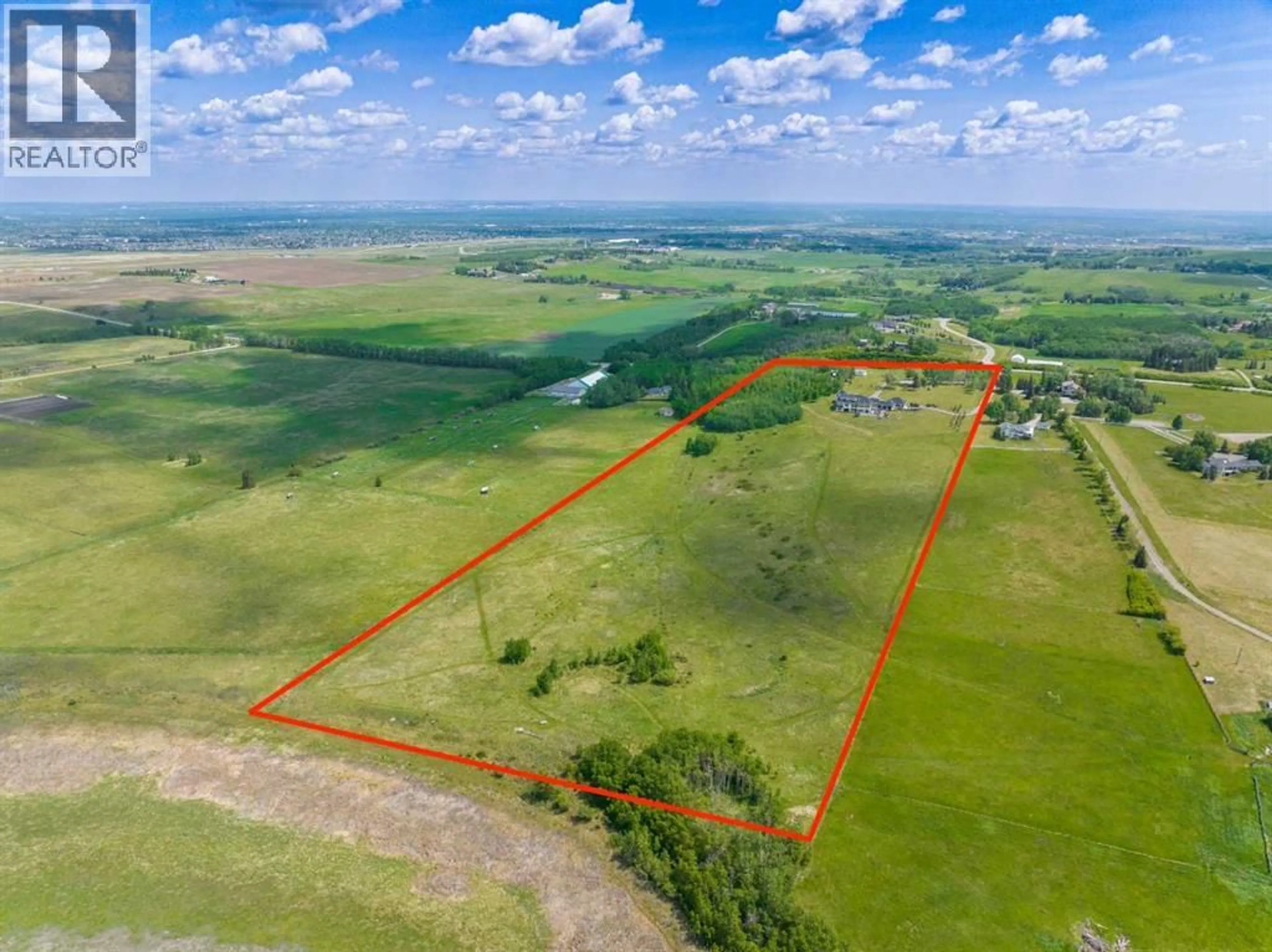 A pic from outside/outdoor area/front of a property/back of a property/a pic from drone, water/lake/river/ocean view for 96012 198 AVENUE WEST, Rural Foothills County Alberta T1S2W6