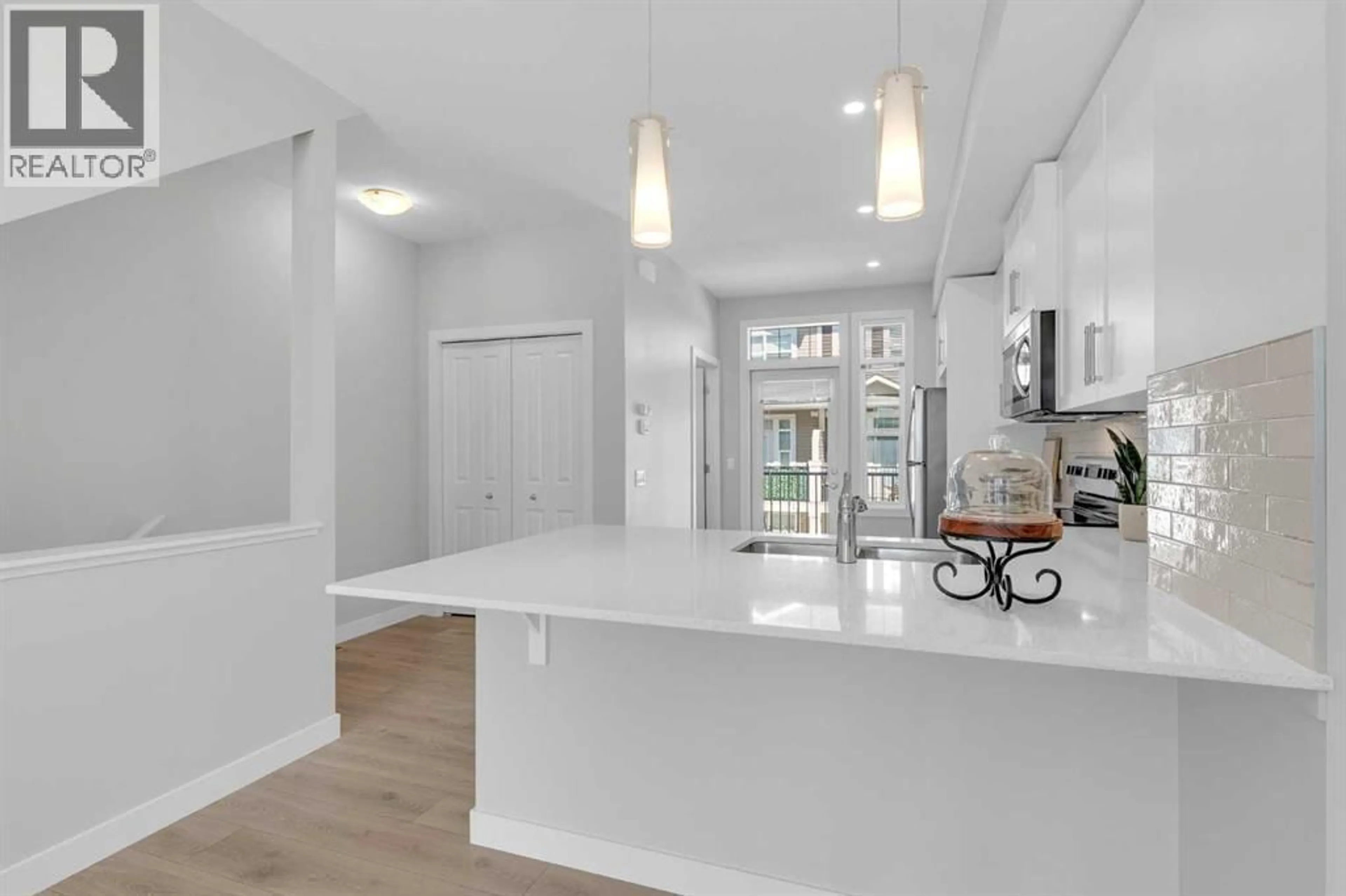 Open concept kitchen, ceramic/tile floor for 118 LEGACY PATH SOUTHEAST, Calgary Alberta T2X4H9