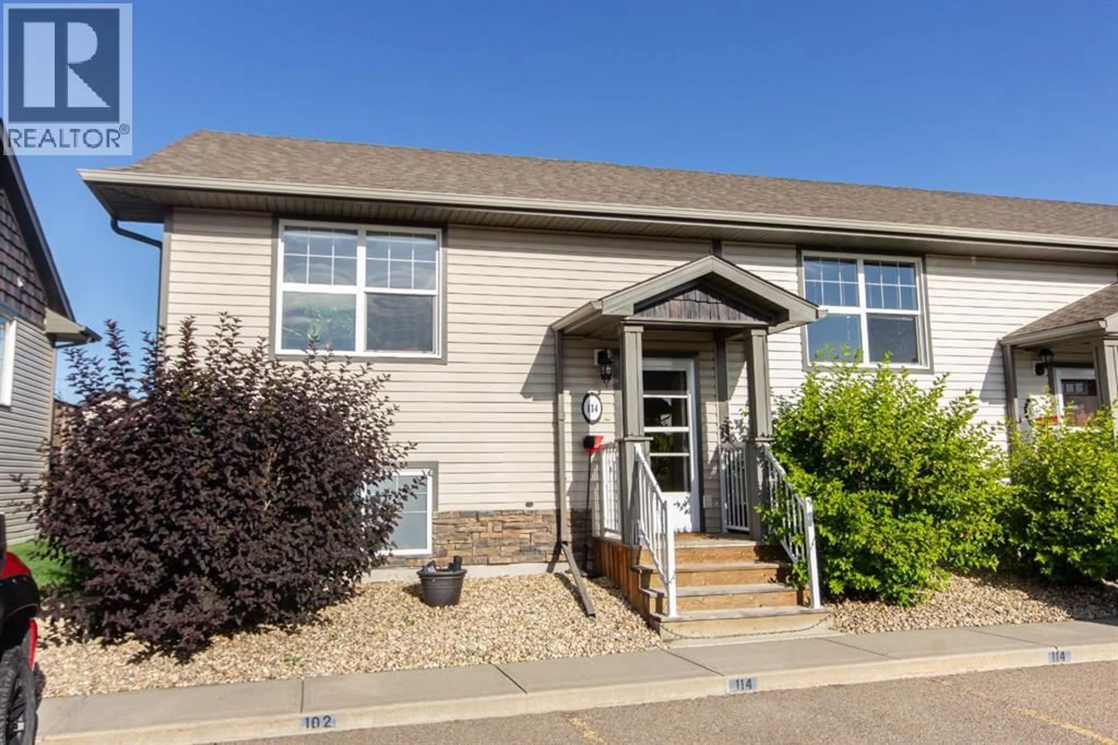 Home with vinyl exterior material, street for 114 REDWOOD BOULEVARD, Springbrook Alberta T4S0J5