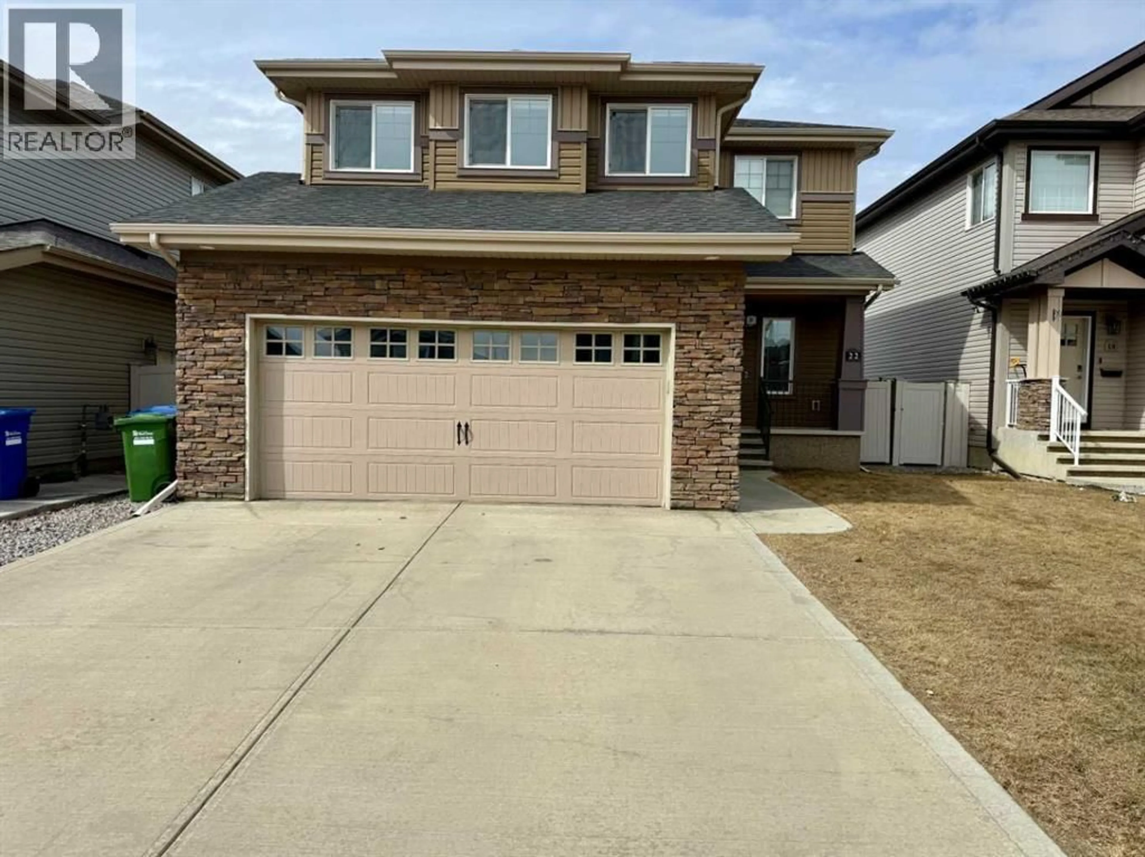 Home with brick exterior material, street for 22 CARIBOU CRESCENT, Red Deer Alberta T4P0T5