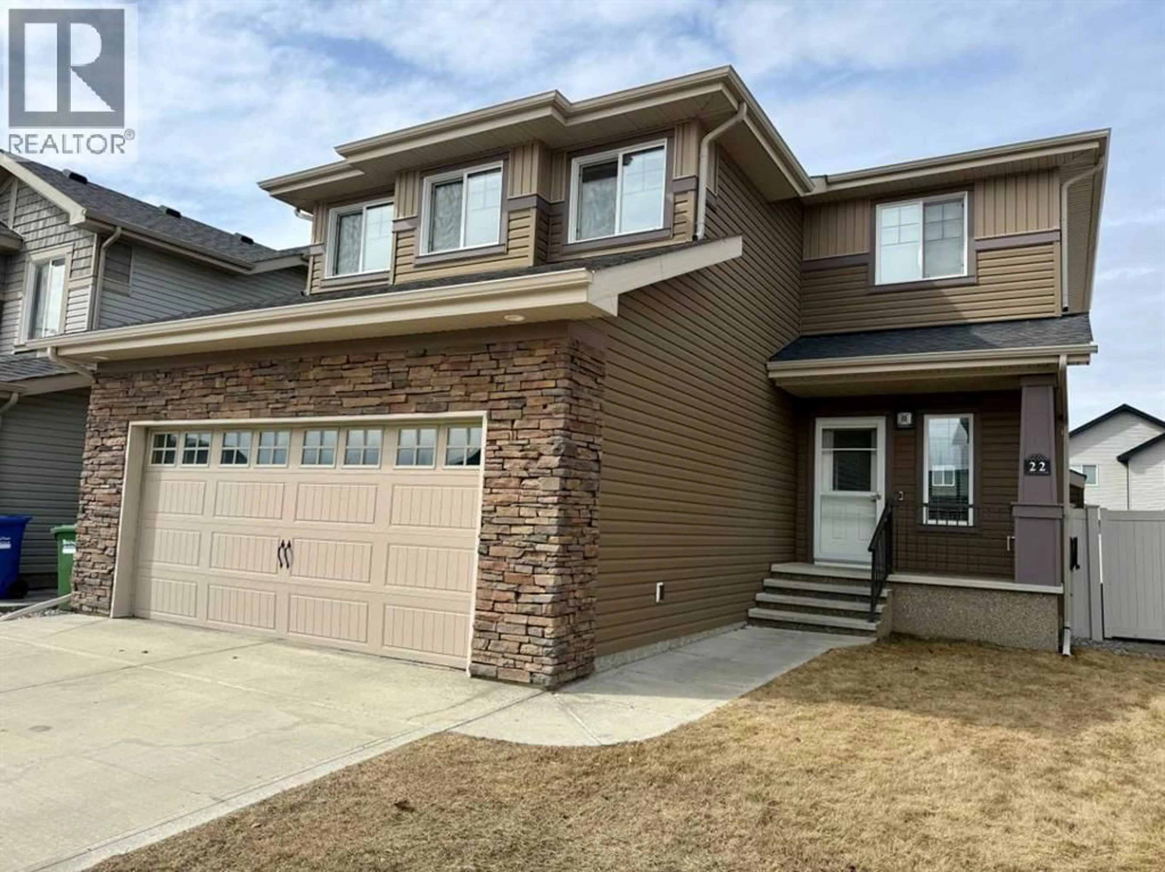 Home with brick exterior material, street for 22 CARIBOU CRESCENT, Red Deer Alberta T4P0T5