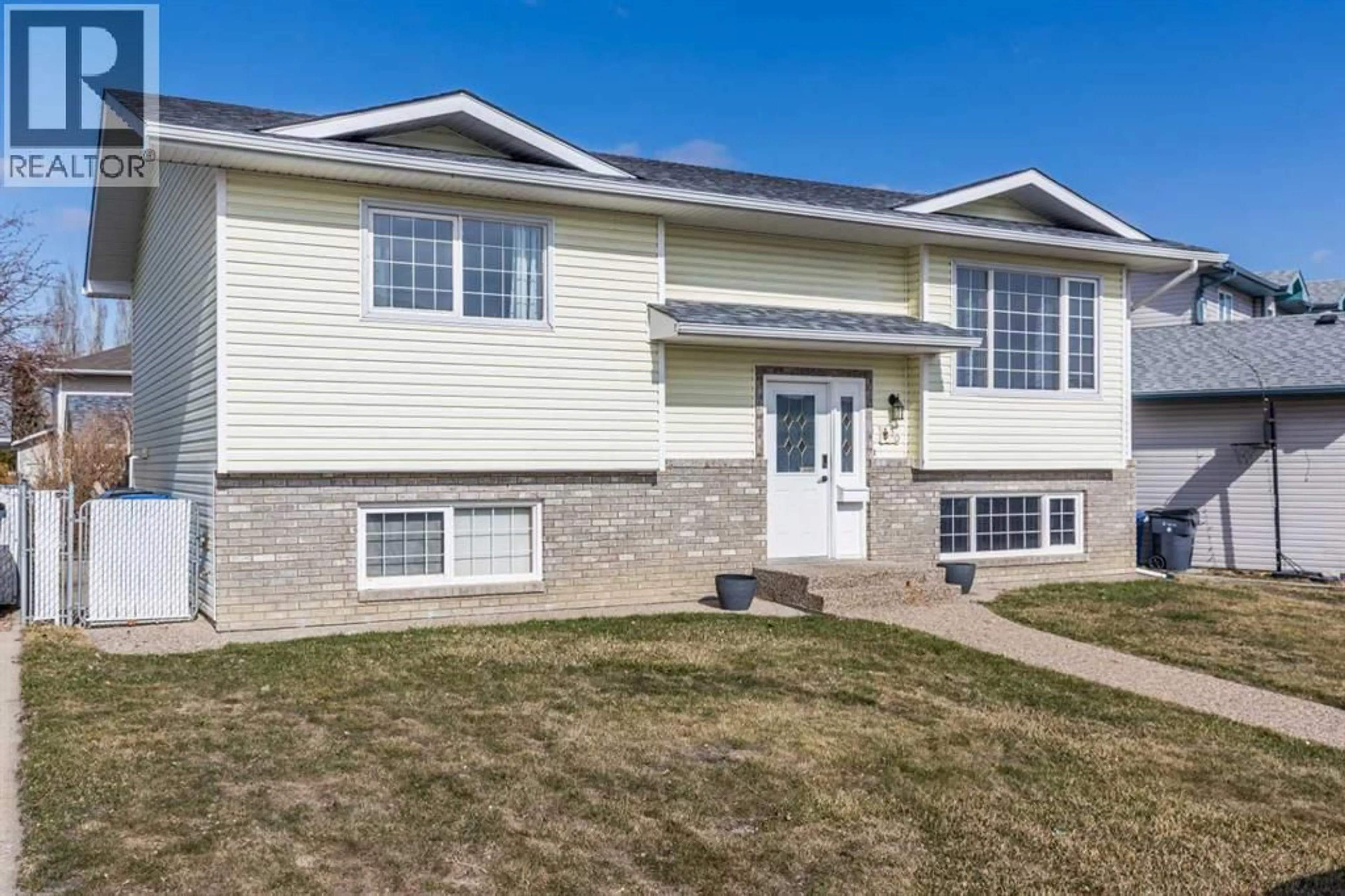 Home with vinyl exterior material, street for 30 SAGE CLOSE SOUTHEAST, Medicine Hat Alberta T1B4H7