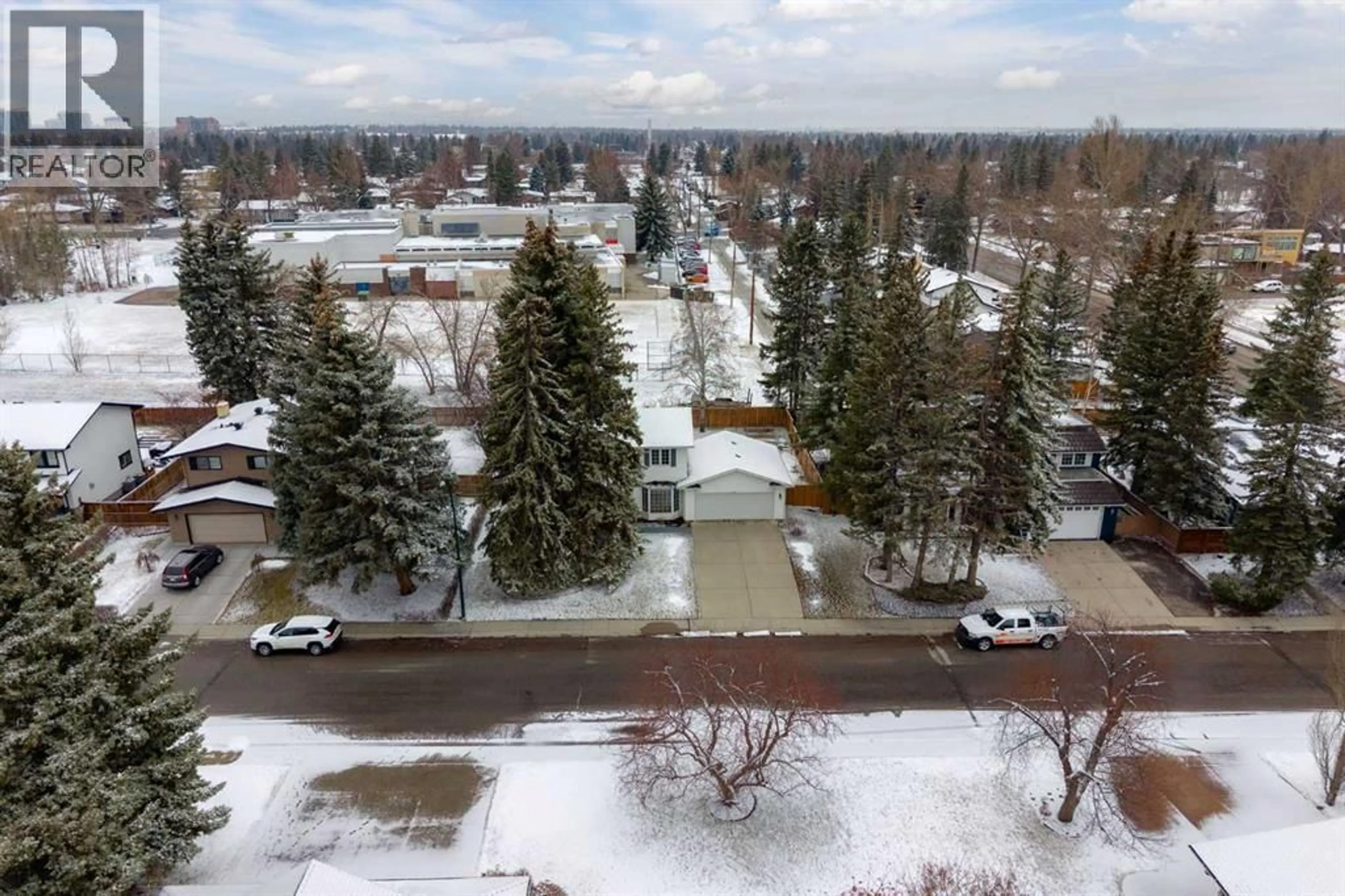 A pic from outside/outdoor area/front of a property/back of a property/a pic from drone, unknown for 356 WILLOW RIDGE PLACE SOUTHEAST, Calgary Alberta T2J1N4
