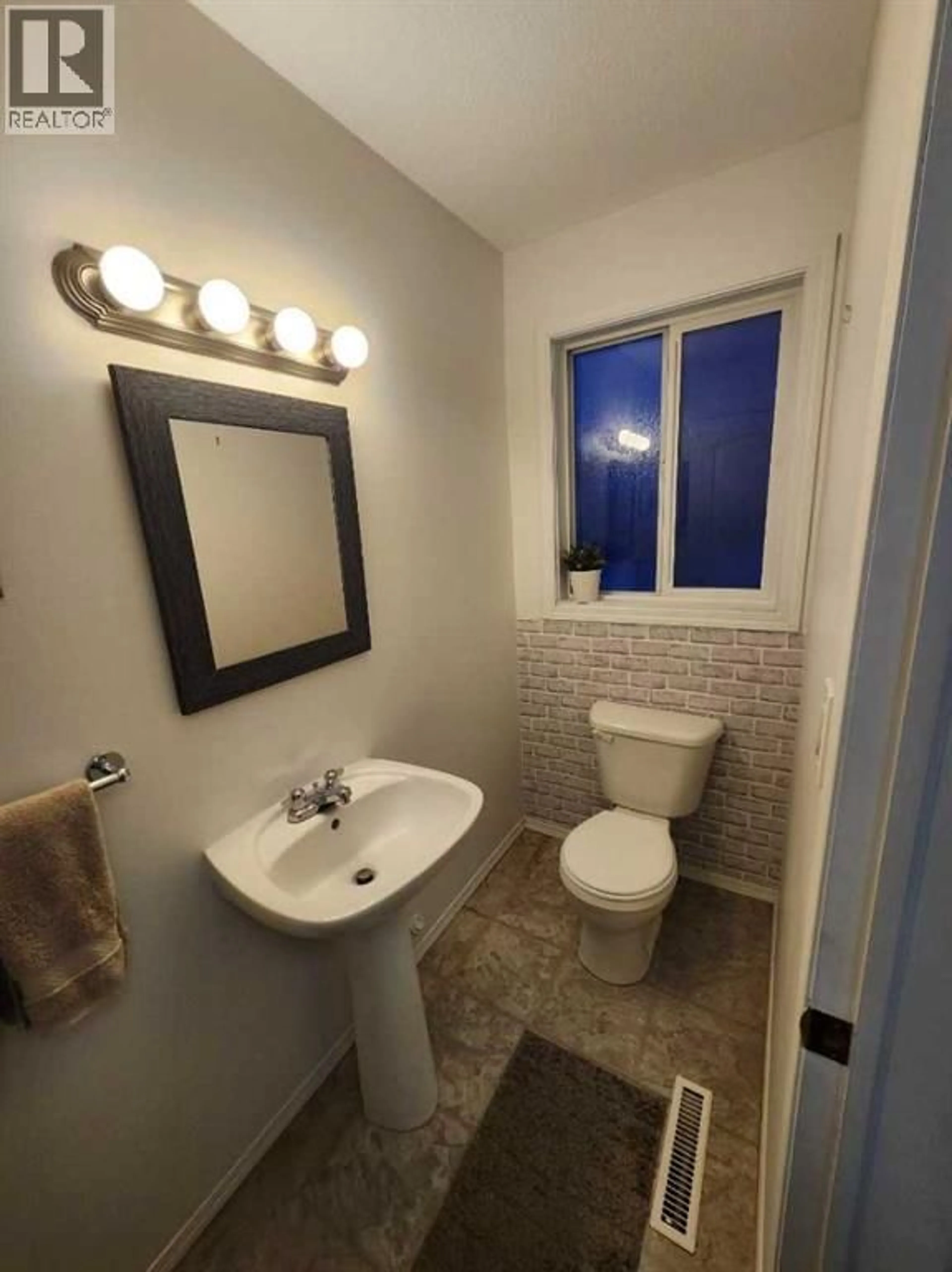 Standard bathroom, ceramic/tile floor for 1 FIR STREET, Red Deer Alberta T4N4Y1