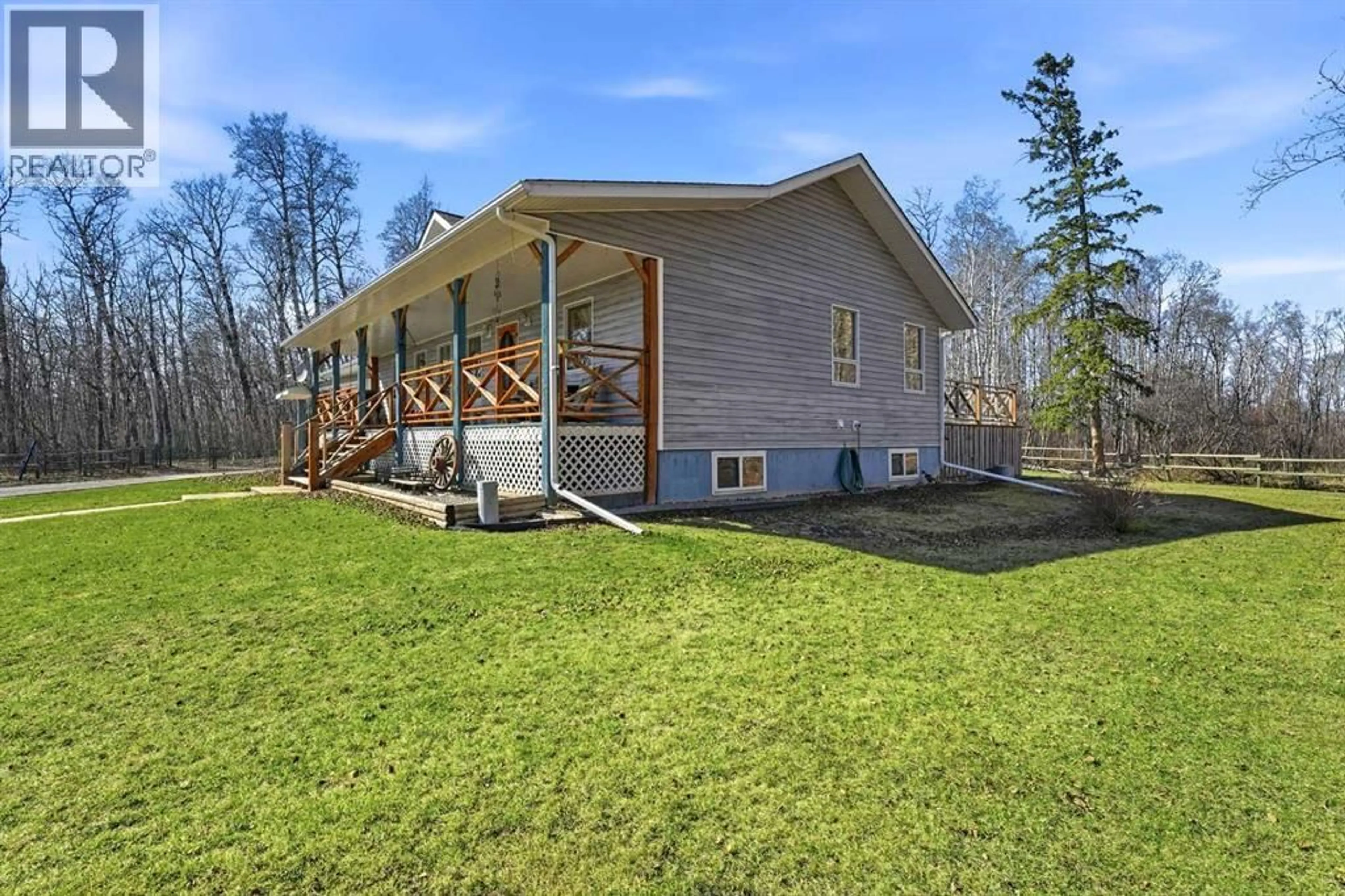 A pic from outside/outdoor area/front of a property/back of a property/a pic from drone, unknown for 39527 RANGE ROAD 31, Rural Lacombe County Alberta T0M0X0