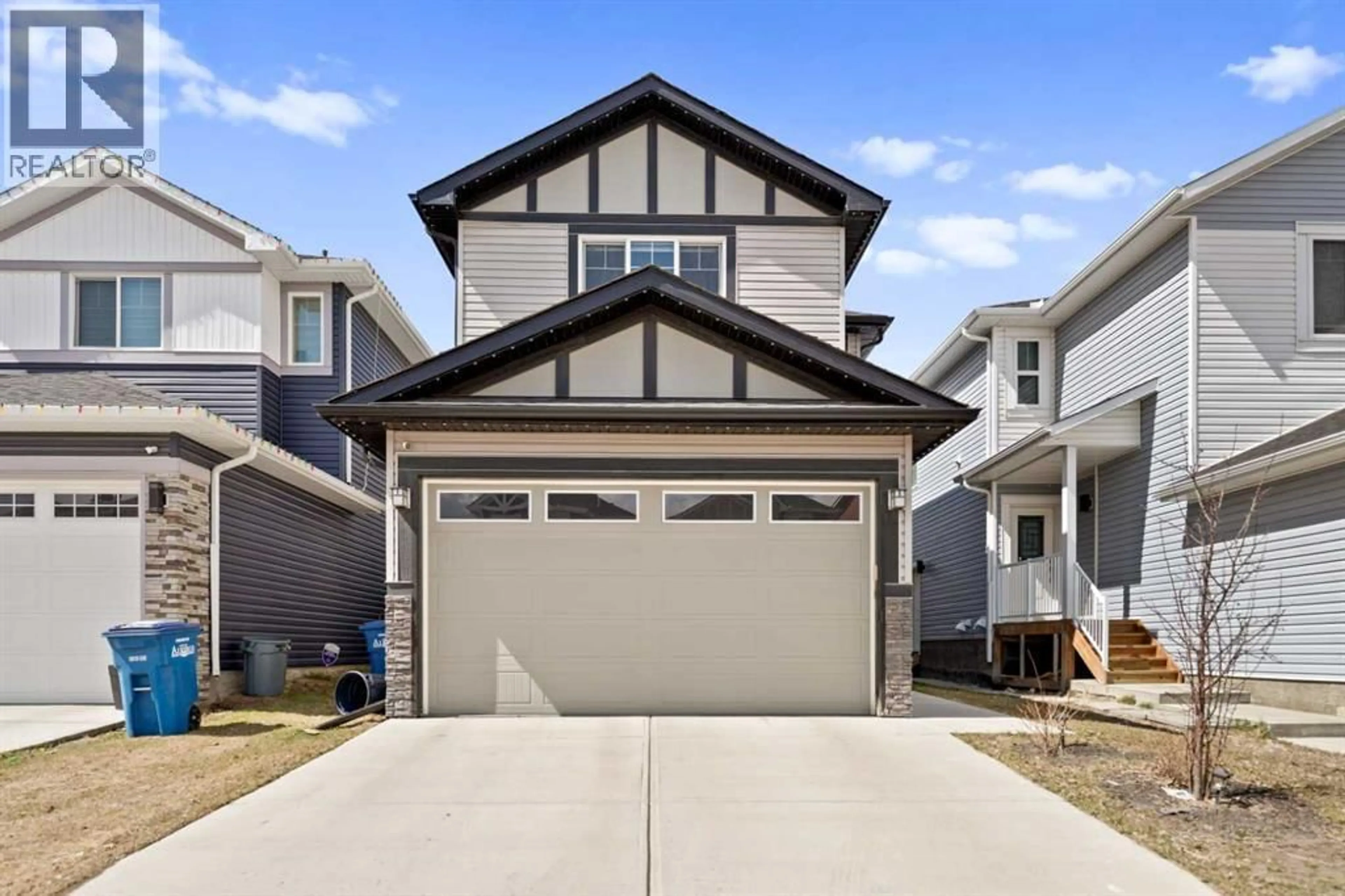 Home with vinyl exterior material, street for 439 BAYVIEW WAY SOUTHWEST, Airdrie Alberta T4B0R7