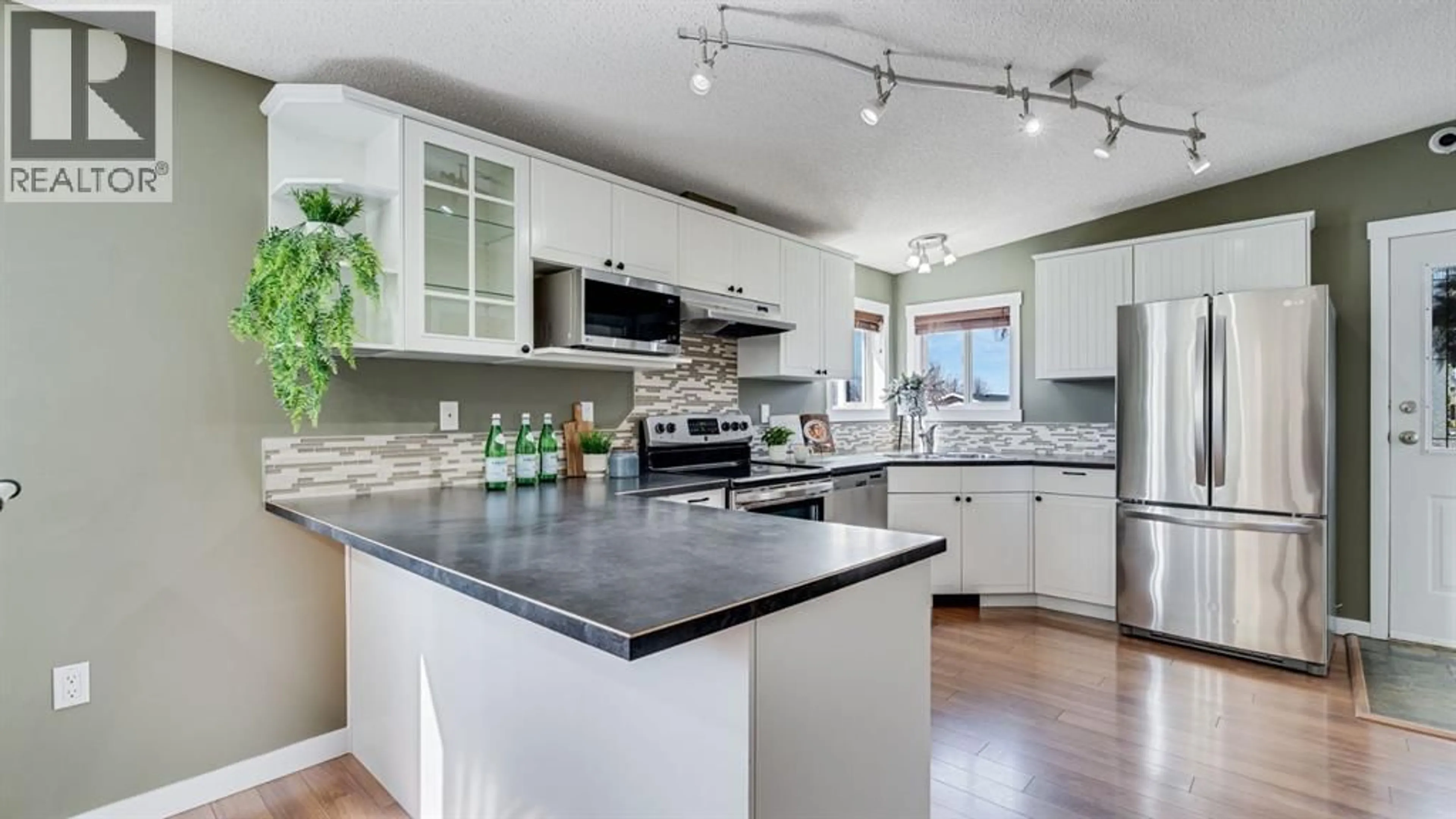 Open concept kitchen, unknown for 156 MEADOWLARK LANE, Carstairs Alberta T0M0N0