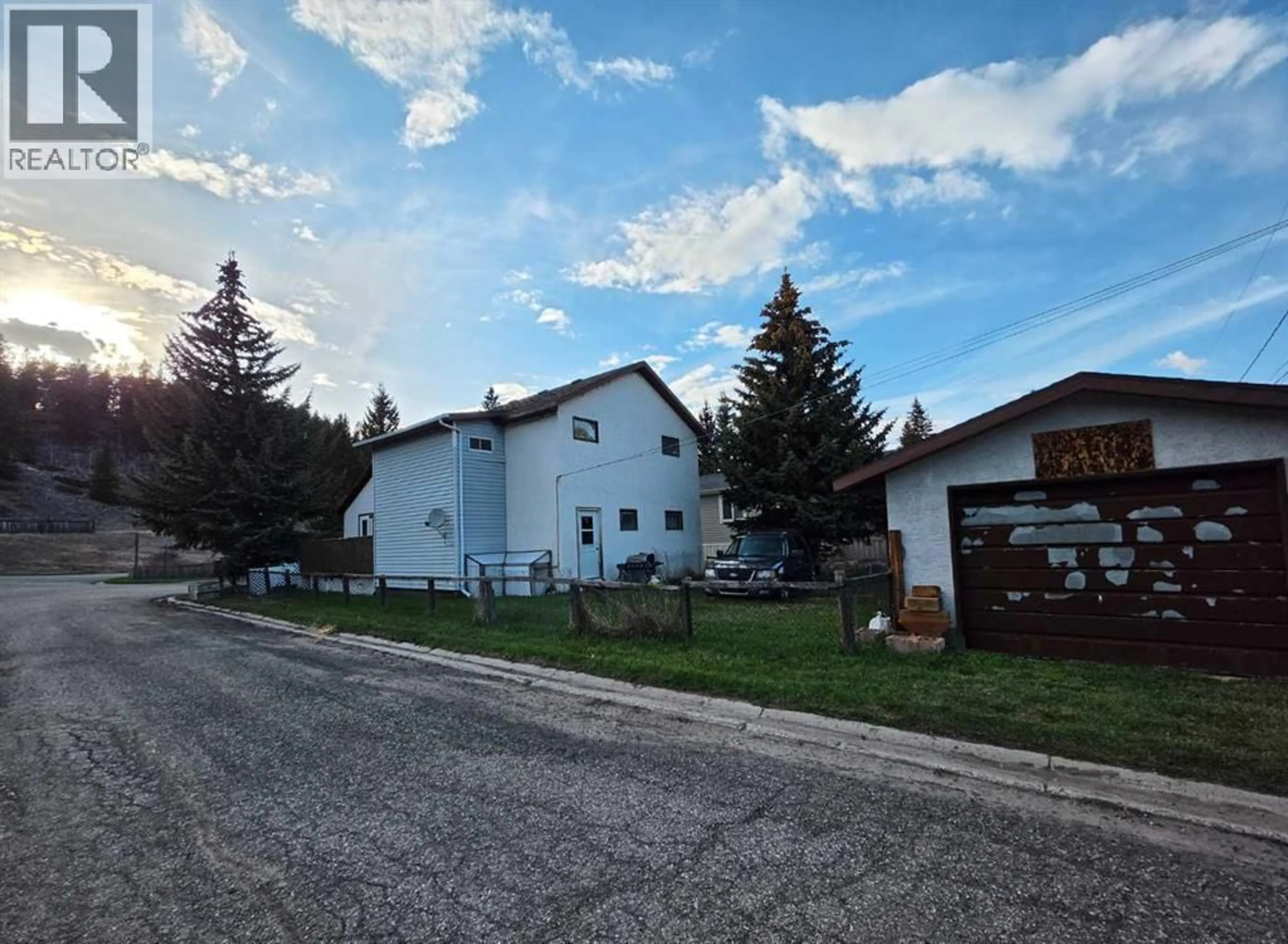 A pic from outside/outdoor area/front of a property/back of a property/a pic from drone, street for 1201 83 STREET, Coleman Alberta T0K0M0