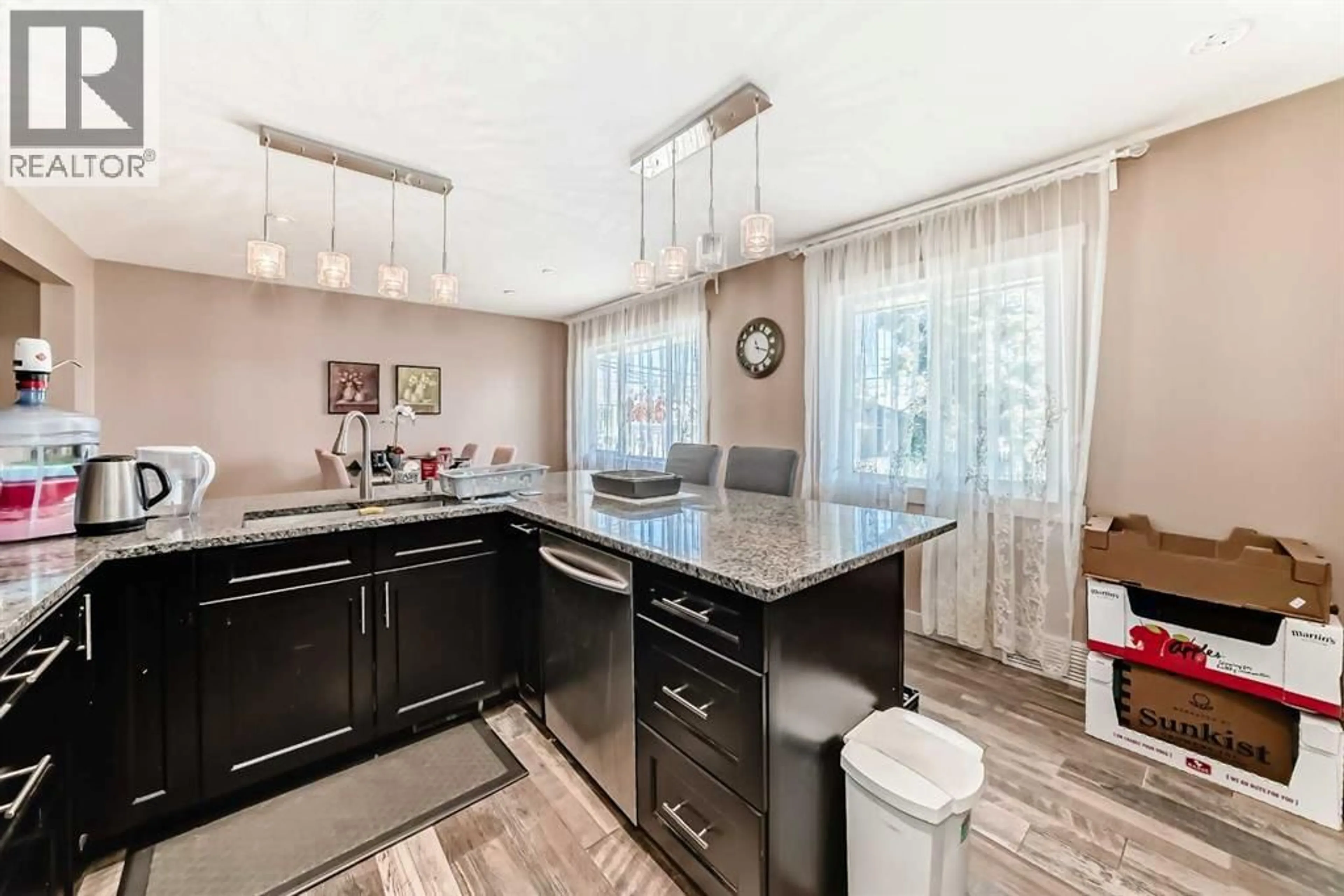 Open concept kitchen, ceramic/tile floor for 2508 MORLEY TRAIL NORTHWEST, Calgary Alberta T2M4G6