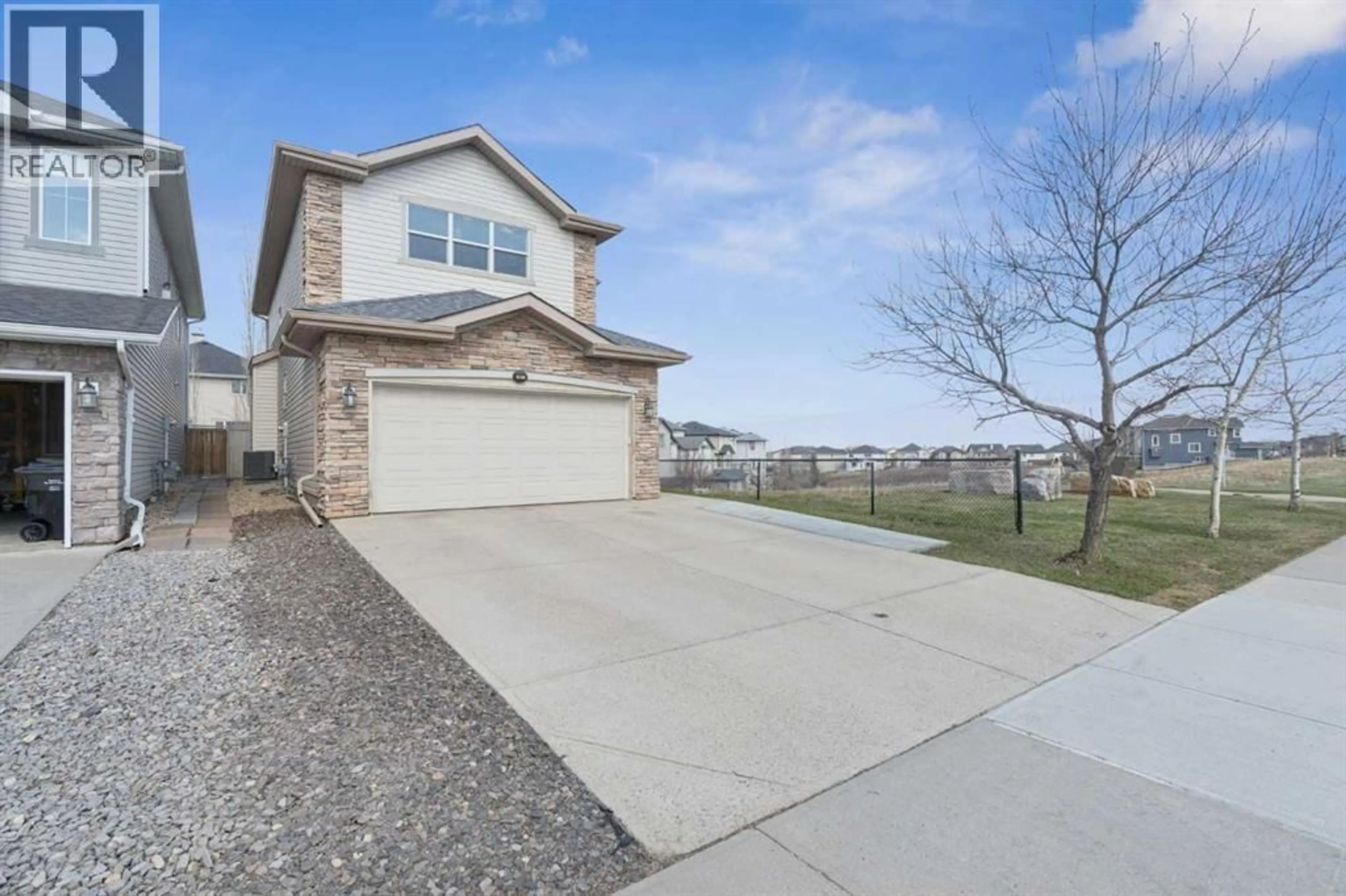 A pic from outside/outdoor area/front of a property/back of a property/a pic from drone, street for 357 KINCORA DRIVE NORTHWEST, Calgary Alberta T3R1N3