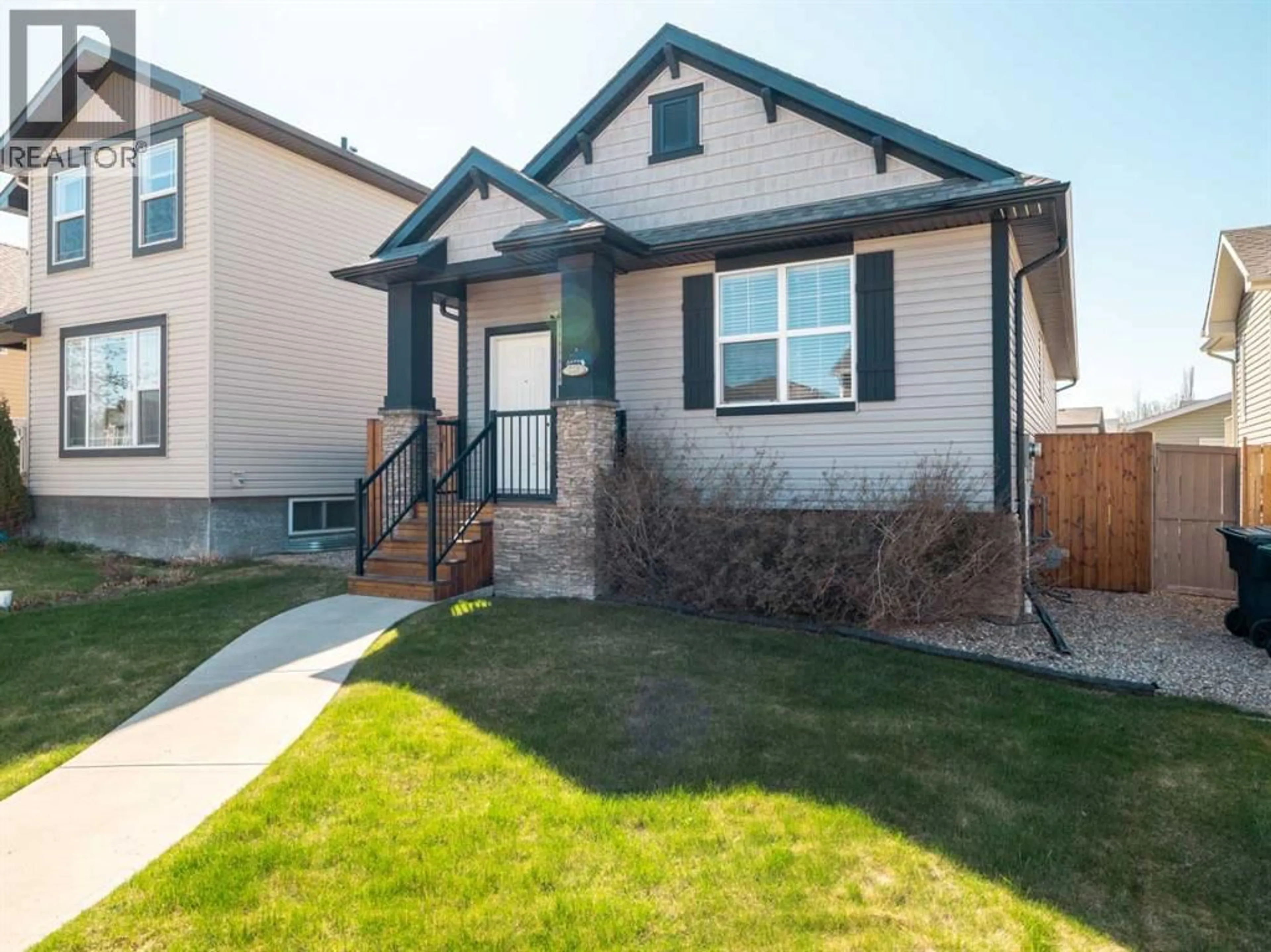 Home with vinyl exterior material, street for 553 MARY CAMERON CRESCENT NORTH, Lethbridge Alberta T1H6V6