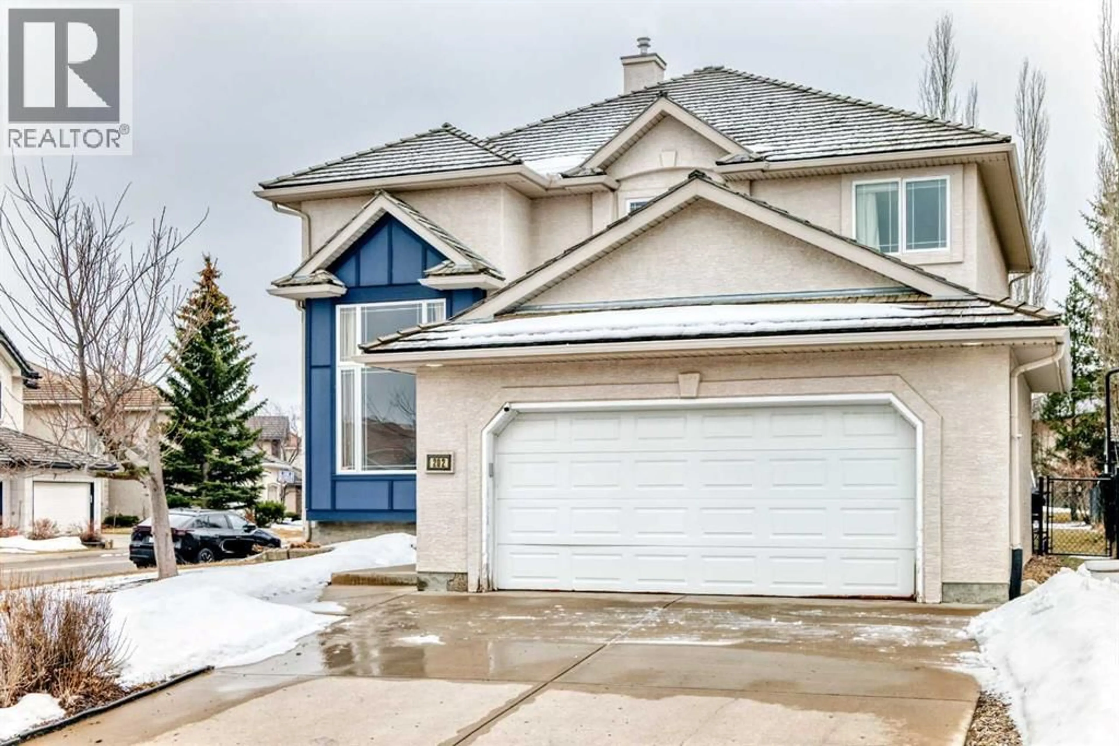 Home with vinyl exterior material, street for 202 HAMPTONS GARDENS NORTHWEST, Calgary Alberta T3A5X4