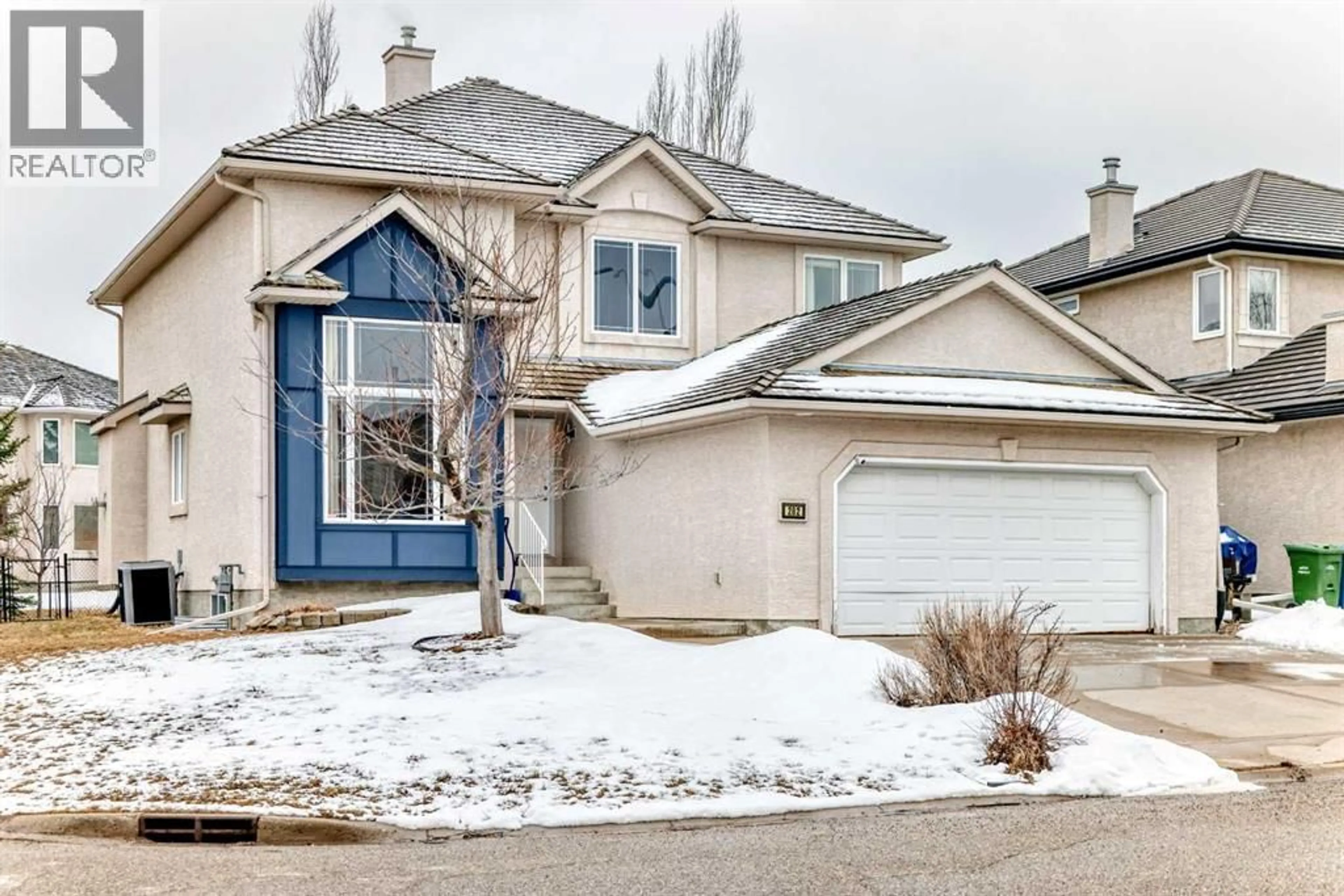 Home with vinyl exterior material, street for 202 HAMPTONS GARDENS NORTHWEST, Calgary Alberta T3A5X4
